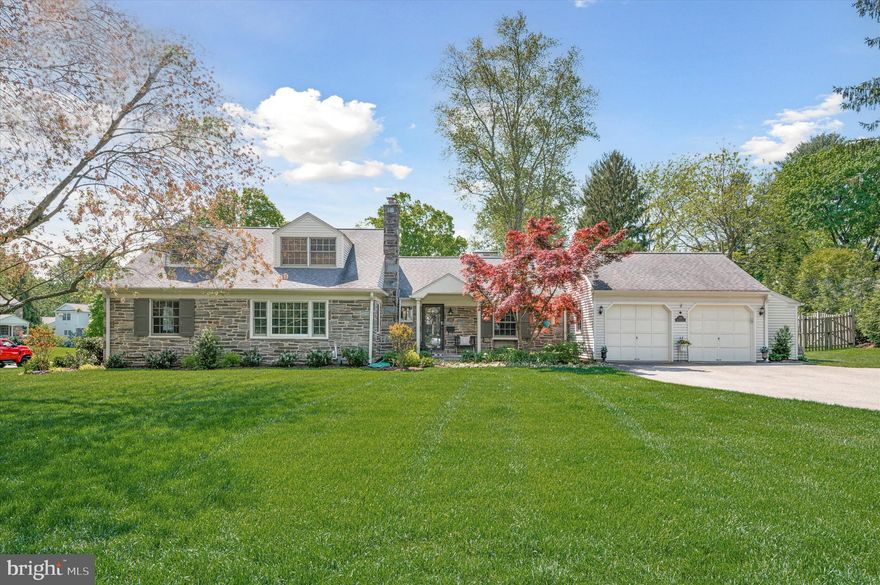 Welcome to 100 Browning Ln, a beautifully renovated 4 bed 2.5 bath stone cape cod with 3,048 SqFt of finished living space and stunning features throughout!  Located in a picture perfect neighborhood in Bryn Mawr, on the Main Line, on a corner lot! Fall in love as you approach the home and are greeted by lovely landscaping and stone and siding exterior. As soon as you enter the home you will feel like you stepped into a designer's showroom. Many renovations took place in this home in June 2022 starting with hardwood floors that span throughout the entire home.  When you enter the rectangular Foyer, next to the coat closet is a stylish main floor powder room that was added to this space with a floating pedestal sink, and cute chic tiling. Continue to the charming fireside living room with a wall of windows to allow plenty of natural sunlight. Speaking of natural lighting, the heart of this home is the brand new renovated kitchen that flows seamlessly into both the dining area and family room as well as the living room with eye-catching exposed white beams, vaulted ceilings and multiple skylights!.  The absolutely gorgeous kitchen with peninsula island and barstool seating includes custom cabinetry, sparkling stainless steel appliances, caesar stone countertops complemented with tile backsplash plus room for a sizable table and an added and welcomed pantry! A rear door from the kitchen leads to the backyard oasis with a lovely screened in porch, and, grassy, flat, fenced yard; a true extension to your home.  Back inside on the main level is also a family room with sliders to the yard and a second wood-burning fireplace with custom soap stone surround and access to the oversized 2-car garage! Continuing on the main level is the spacious primary bedroom with two custom fitted closets.  The second bedroom or perfect in-home office/ is a great guest bedroom option. The fantastic renovated full hall bathroom offers a luxurious shower tub combination with neutral tile and fixtures, vanity, and custom shelving for storage.  The additional other two bedrooms can be found upstairs both equipped with custom closets and also organization shelves and an additional small, low ceiling closet and beyond that, a floored attic storage.  The full hall bathroom is nicely upgraded to a modern seamless glass enclosed stall shower, gorgeous light sconces, radiant flooring, and additional custom storage and gorgeous vanity.  All this, plus, the spacious unfinished lower level with Bilco Door egress and even more space for possible expansion with high ceilings is where two-sets of W/D are located as well as a walk-in cedar closet! Recent 2022 updates include: new kitchen and bathrooms including added powder room on main level, hardwood flooring t/o, all new paint t/o, new landscaping and exterior uplighting, custom fitted closets t/o, all new light fixtures t/o, new window treatments t/o, and new garage openers.   100 Browning Ln is located within the award-winning Radnor School District as well as the finest private schools on the Main Line, and walking distance to SEPTA's Paoli Thorndale line Rosemont R5 Station, Villanova University, Clem Macrone Park, Garrett Hill Restaurants and just minutes from Radnor Trail, Downtown Wayne, Downtown Bryn Mawr, and Suburban Square.  Don’t miss your opportunity to own this turn-key home in a truly special neighborhood in Radnor Twp.
