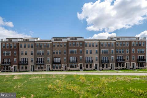 Photo of 20875 Murry Falls Ter, ASHBURN, VA 20147 (MLS # VALO2129850)