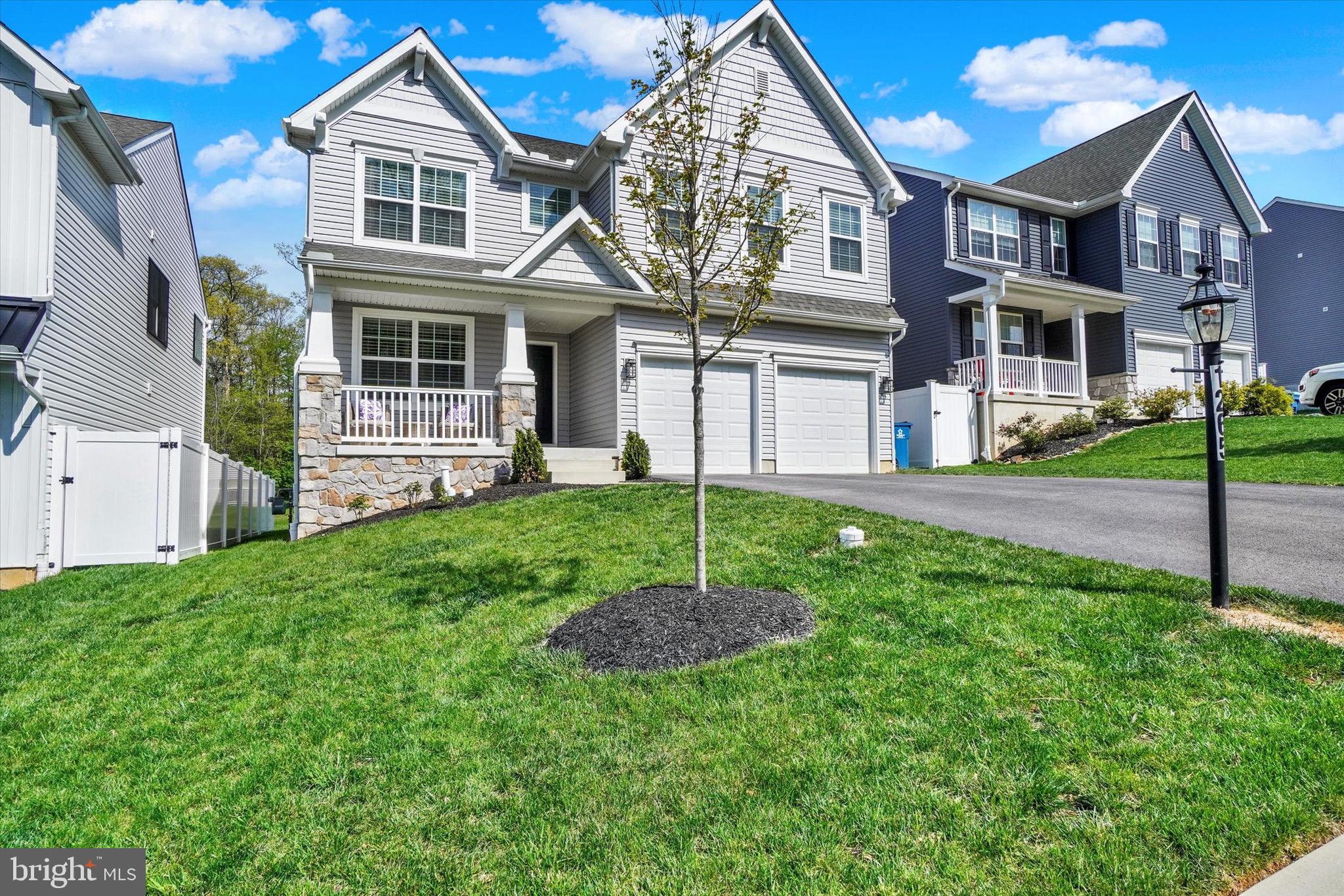 If you're searching for a home that feels brand new—without the wait or expense of building—look no further! This stunning property in the desirable Kensington neighborhood, within Windsor Township and the Red Lion School District, offers modern living in a serene, picturesque setting.
Nestled among lush greenery and rolling hills, this home provides the perfect balance of tranquility and convenience. You'll enjoy peaceful suburban living just minutes from essential amenities. The Red Lion community is known for its rich history, strong community spirit, and abundance of recreational opportunities—from scenic parks and hiking trails to year-round community events—making it ideal for families and outdoor lovers. Location is everything, and this home delivers—just a short walk from Larry J. Macaluso Elementary School, offering convenience for busy families.
From the moment you arrive, the exceptional curb appeal stands out. The meticulously maintained landscaping and welcoming front entry set the tone for what’s inside. Step into the elegant foyer and immediately feel at home. Just off the entrance, you’ll find a versatile front office or sitting room and a convenient half bath. The heart of the home is the open-concept main living area, designed for both everyday living and entertaining. The gourmet kitchen features granite countertops, a large center island, ample cabinet storage, and a walk-in pantry. The island is perfect for meal prep, casual dining, or enjoying a glass of wine with friends. The kitchen flows seamlessly into the spacious living room, highlighted by a cozy fireplace, creating a warm, inviting space for gatherings.
The adjoining dining area is filled with natural light and provides easy access to the kitchen and living room, making mealtimes a joy. For added convenience, the mudroom and garage access are located just off the kitchen. Upstairs, you’ll find four generously sized bedrooms, including a luxurious primary suite complete with a walk-in closet, soaking tub, standing shower, and dual vanities. A second full bath and a centrally located laundry room add to the home's functionality.
The expansive unfinished basement offers endless potential—create a home gym, theater, or additional living space tailored to your needs. Whether you're hosting holiday gatherings or summer barbecues, this home’s thoughtful layout makes entertaining a breeze. Don’t miss your chance to own this beautifully maintained, move-in-ready gem in one of Red Lion’s most sought-after communities.