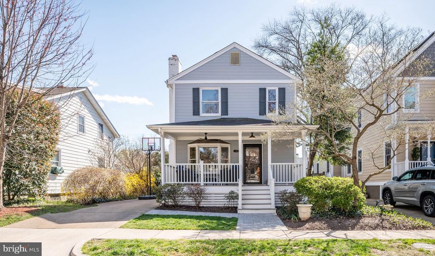 Charming farmhouse in Rosemont with an ideal layout -  3 bedrooms and 2 full baths upstairs!  Main level with beautiful hardwoods, handsome built in bookcases, two living spaces, renovated powder room, open kitchen with stainless appliances, crisp white cabinets and striking center island. The charming front porch greets you to this beauty - a great place for evening cocktails, Saturday morning coffee or to just sit and watch the world go by! The front sitting and living rooms feature soaring ceilings and a bright and airy feel. These rooms easily flow into the kitchen  and dining rooms - the kitchen has great  cabinets with rollouts for maximum storage. Just off the dining area, walk out to the two tiered deck which overlooks the manicured back yard. A gorgeously renovated powder room with great wallpaper, board and batten trim details, marble vanity and brushed gold fixtures rounds out this level. Head upstairs to three bedrooms and two full baths. The primary suite is very large and boasts double closets. The en-suite bath (just renovated) is a spa-like retreat with a double vanity, frameless glass shower with dark blue subway tile, and hexagon Carrara flooring. Just off the primary, the private balcony overlooking the rear yard is perfect for morning coffee or working from home on warm spring days. Down the hall, you will find two generously sized bedrooms and a shared hall bath (also just redone).  The basement is ideal for storage and houses the HVAC and water heater. Leave your car in the driveway and walk to Braddock Road Metro, King Street Metro, Old Town, Del Ray and more. Welcome Home!
