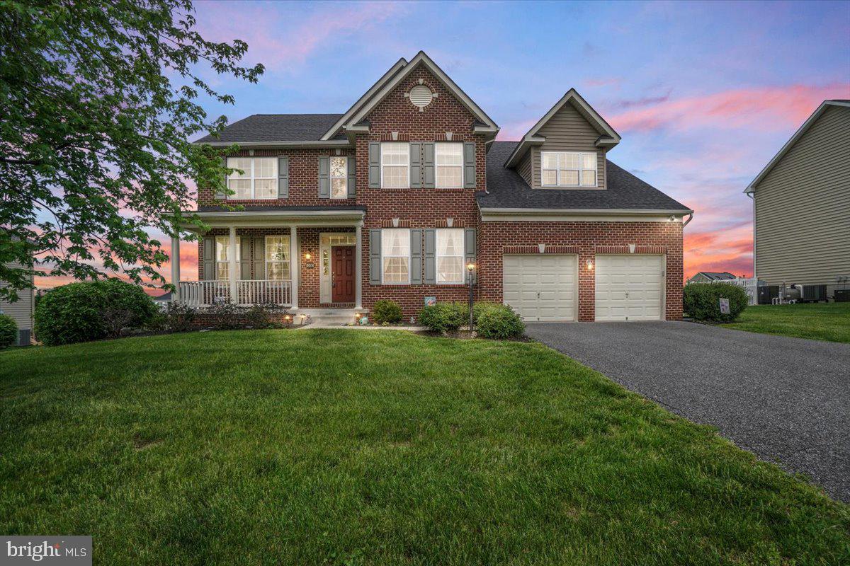 Welcome to this beautifully maintained 4-bedroom, 2.5-bath home with a two-car garage, nestled in the sought-after picturesque Elmwood Farm neighborhood.
This stunning home features a stately brick front, a newer architectural shingle roof, and a recently updated furnace. Step outside to a composite deck with low-maintenance vinyl railings, overlooking a flat, fully fenced backyard nearly half an acre of usable space perfect for entertaining or simply relaxing.
Inside, the main level features fresh paint, gleaming hardwood floors, a spacious pantry, and an oversized kitchen island paired with stainless steel appliances including double ovens ideal for both everyday living and hosting. The open floor plan flows seamlessly into the great room, where a cozy gas fireplace and soaring ceilings create a warm and inviting atmosphere. A versatile bonus room provides the perfect space for a home office, guest room, or play area, and a convenient half bath. Laundry is conveniently located on the main level.
Upstairs, you'll find four generously sized bedrooms and two full bathrooms. The luxurious primary suite includes a double vanity, soaking tub, separate shower, and a large walk-in closet, along with two additional closets offering ample storage.
The unfinished walkout basement presents endless potential, featuring abundant storage space and a rough-in for a full bathroom.
Located just minutes from Elmwood Farm Bed & Breakfast (regularly hosts community events, holiday events and a summer concert), parks, C&O towpath, Downtown Hagerstown, restaurants, shopping, entertainment, and major commuter routes to Washington, D.C., Baltimore, and Northern Virginia, this home offers the best of comfort and convenience.
Don't miss your chance to schedule your showing today!