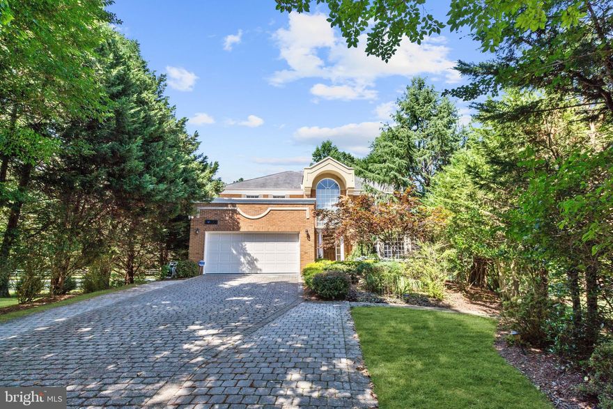 BRAND NEW PRICE!  Owner is ready for an offer. This fabulous home in sought after Avenel is adjacent to the TPC at Avenel golf course with wooded views on a private cul-de-sac! Welcome to this bright and inviting home with high ceilings and beautiful hardwood floors throughout. The front door invites you into a stunning marble floored entry foyer with large marble columns leading down the hall.  Off the main hallway leading to the living room is a beautiful wood paneled library. The formal living room with gas fireplace opens up to the dining room that overlooks the spacious family room with high ceilings below. The gourmet kitchen with granite counter tops includes an island and a breakfast nook with views to the outdoors. The upper level features the master suite with walk-in closet and gorgeous master bath. The second and third bedroom along with two full baths overlook the wooded golf course and complete the second level. The lower level includes a large recreation room with wet bar, fourth bedroom and full bath. The outdoor space boasts a large stone patio with plenty of space to entertain. Avenel provides full landscape maintenance, swim and tennis club, private surveillance, and snow removal on major streets. Thirty minutes to National and Dulles Airports.  A wonderful full service community.