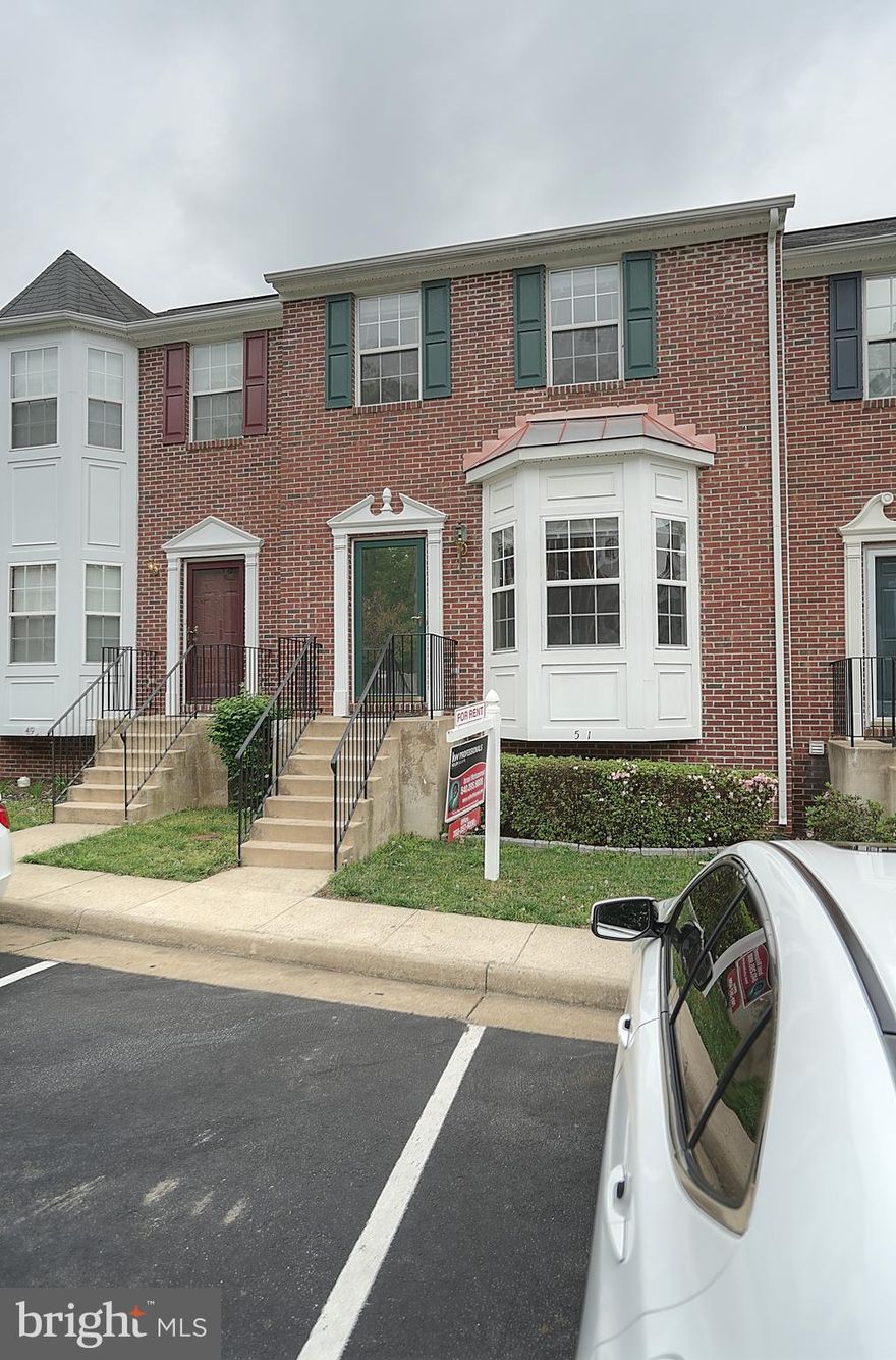 Spacious 4BR/3.5BA townhouse with desired features for today's living Granite countertops, SS Appliances, Tiled Floors * 3 finished levels * the open design enhances the sun-filled LR, separate DR & large kitchen leading to the deck for your morning coffee. Then there is the gas fireplace for those cozy evenings in your rec room, plus the den/study/guest room. 1 bed NTC PICS FROM PRIOR LISTING