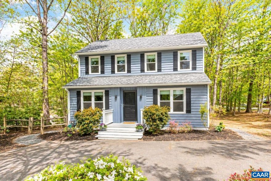 Paradise Found at Lake Monticello.  Enjoy living in this lovely 3 bedroom home w/ large deck & fenced rear yard.  Take advantage of the pool, beaches, golf, tennis, boating & more!   Come tour this home to experience the value & prime location then make this house your home!!!,White Cabinets,Wood Cabinets,Wood Counter,Fireplace in Great Room