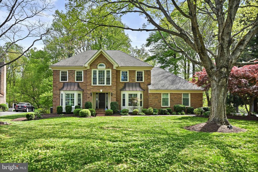 Move-in ready single-family home in the highly sought-after Langley Oaks neighborhood, ideally located within the Churchill Road, Cooper, and Langley High School pyramid and just moments to Langley High School. This home offers an elegant, welcoming floor plan with hardwood flooring, recently replaced carpet, and custom shutters on  main level windows.

The main level blends function and charm, featuring formal living and dining rooms, along with a versatile office or homework space complete with built-ins. The spacious Family Room opens to the kitchen and includes a gas fireplace and direct access to the screened-in porch. The beautifully updated kitchen is designed for both everyday living and entertaining, offering table space, a breakfast area, custom pantry, skylights, and abundant counter space and storage. The kitchen flows into a well-appointed laundry room with garage access and an exterior side entrance. A powder room completes the main level.

Upstairs, the home features four bedrooms and two full bathrooms. The expansive Primary Suite offers exceptional space and functionality, highlighted by a large custom walk-in closet with center island, a sitting room ideal for an office, nursery, or flex space, and a luxurious, updated en-suite bath with dual vanities, soaking tub, and walk-in shower. Three additional bedrooms include wall-to-wall carpeting and ample closet space. The hall bathroom has also been updated.

The walk-out lower level provides multiple flexible living areas, bonus rooms, generous storage, and an updated full bathroom. A dedicated exercise room offers versatility to suit a variety of lifestyle needs.

Outdoor living is equally impressive, featuring a fully fenced rear yard, deck, and screened-in porch—perfect for relaxing or entertaining. Enjoy nearby neighborhood walking paths & direct access to major commuting routes.