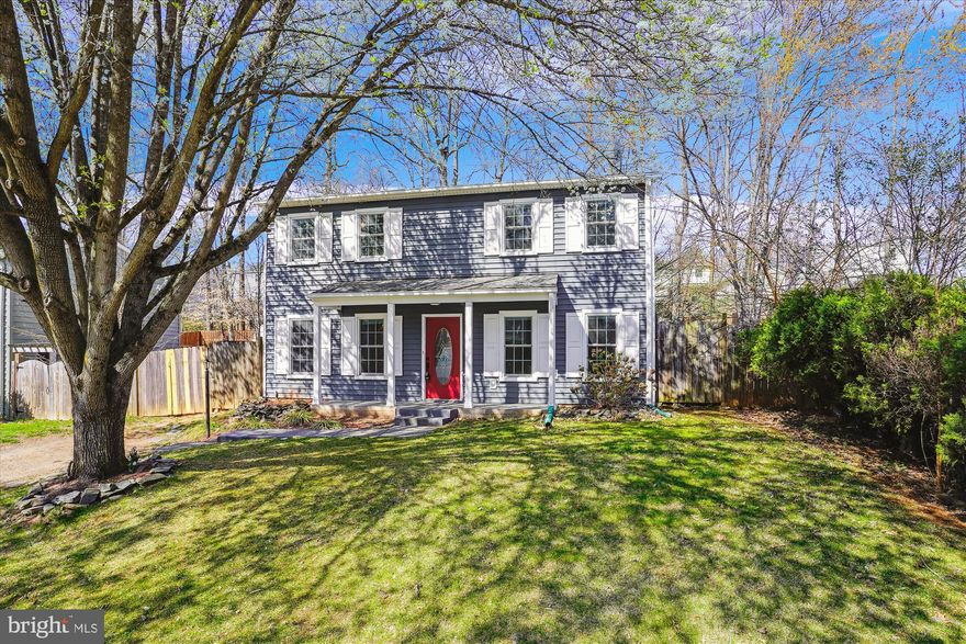 Stunning single-family home in Woodbridge! The main level boasts both a cozy family room with fireplace and an inviting living room, perfect for relaxation. The gourmet kitchen features stainless steel appliances, a spacious island, and a separate dining area. The beautiful primary suite showcases gleaming hardwood floors and a luxurious upgraded ensuite bathroom. Two additional bedrooms share a hallway bath. A versatile bonus room offers endless possibilities—ideal for a home office, gym, craft room, and more! Step outside to a large back deck overlooking the fully fenced-in yard, perfect for outdoor enjoyment. Laundry included. Quick access to Rt 234 and I-95.