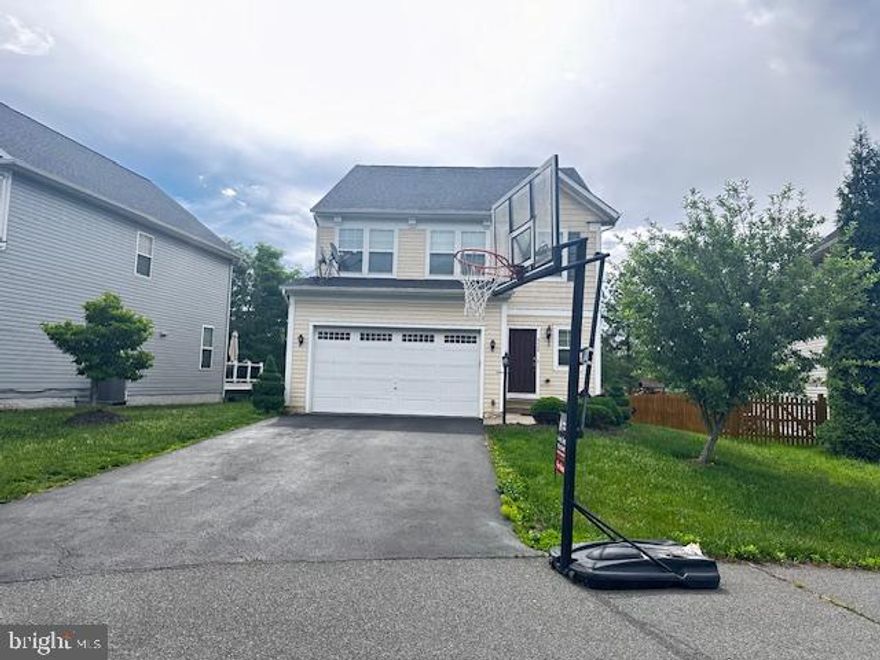 Welcome to this beautifully maintained single-family home, ideally situated on a quiet cul-de-sac. This spacious residence offers three fully finished levels with 5 bedrooms, 3.5 bathrooms, and a two-car garage, combining comfort, style, and functionality.
The open floor plan is filled with abundant natural light and begins with a welcoming foyer, convenient powder room, and a mudroom with direct access to the garage. The main living and dining areas flow seamlessly to the backyard and charming stone patio, perfect for everyday living and outdoor entertaining. Enjoy engineered laminate hardwood flooring throughout all three levels and recessed lighting throughout the home. The gourmet kitchen features a gas range, elegant backsplash, quartz countertops, a center island with sink, and ample cabinetry for storage. The upper level offers four generously sized bedrooms, and laundry room. The fully finished lower level includes one bedroom, a full bathroom, a spacious family  entertainment room, a storage den, and a utility room, ideal for guests or extended living needs. A large driveway accommodating up to four vehicles completes this exceptional property.