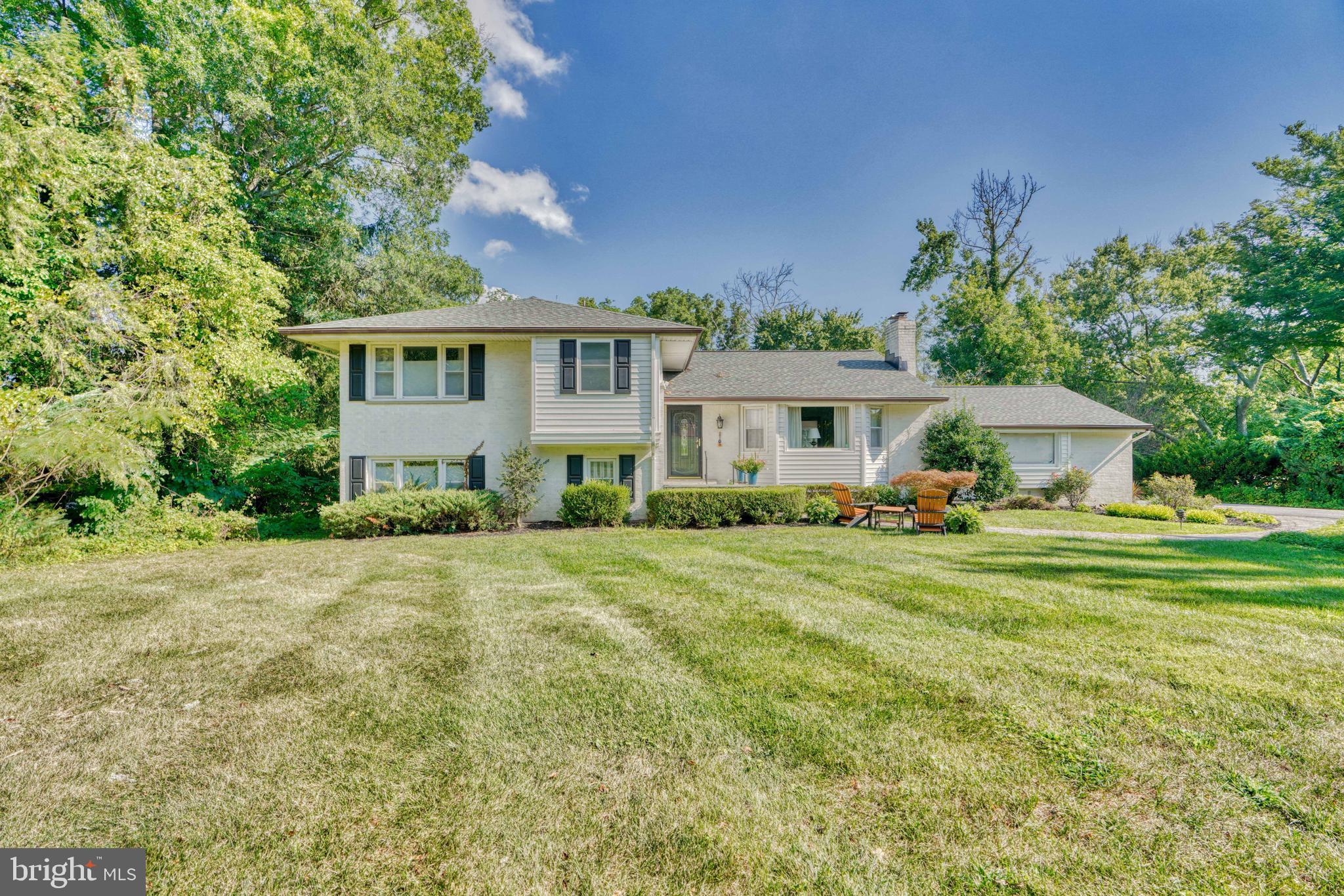 Offer deadline highest and best Sunday 3/12 at 9:00 am. Open House Saturday 3/11 12-2 pm. Turn key, amazingly stylish, completely & thoughtfully updated & expanded, multi-level 4 Bedroom, 3 Full Bath, attached 2 car garage home with a salt water pool on almost an acre in sought after Valley Crest! The home is ideally situated on the lot with a welcoming front porch entrance that leads you into a tasteful Main Level spacious Living Room featuring a wood burning fireplace, bay windows, and recessed lighting. The Main Level with its gleaming hardwoods, has perfect circular flow and all rooms lead to the completely updated Gourmet Kitchen. The Chef's Kitchen has all the bells & whistles including upgraded stainless appliances, wine refrigerator, acres of granite countertops, floor to ceiling cabinetry, a pot filler, custom backsplash, pendent task lighting, recessed lighting, and a large center Island with ample underneath storage and stool space. The Kitchen wraps around to a generously sized, window filled Dining area with french doors leading to an awning covered back deck and down to the large Patio, covered Gazebo area, salt water pool with a slide, and plenty of green space. A half level up you will find 3 large Bedrooms and 2 renovated full baths. The carefully updated Primary Bedroom features an expanded en-suite Bath and 2 separate closets including a custom walk-in closet. This delightfully enlarged Primary Bath features a floating double vanity with custom backsplash, custom shower with seating & upgraded fixtures, and plenty of lighting. All Bedrooms have ceiling fans and hardwoods throughout.
Half a level down from the Main Level you will find a large Family Room with a wood burning fireplace, doors leading out back, a 3rd renovated Full Bath and the 4th Bedroom with 2 windows, currently being used as an Office. Another half level down, you'll find a home gym and laundry area, additional storage space and entrance to the attached 2 car garage. The Garage has a 220V 50 Amp Charging Line / Plug exclusive for a Full EV car(or Hybrid) (Level 3 Station). The home also includes many "Smart" features including an alarm system with Frontpoint SS, Ring Cameras, Smart lights (remote controlled from phone) for front and back yard and some interior lighting, Nest system and separate unit for Heating system. See full list of upgrades ...including roof & roof insulation (2017), A/C (2021), H2O heater (2022) ...as there are too many to list!
Set on a private fenced lot backing to trees with plenty of green space this is truly a rare find! Bring your most discriminating Buyers...this one will not disappoint!
See attached Virtual floorplan.