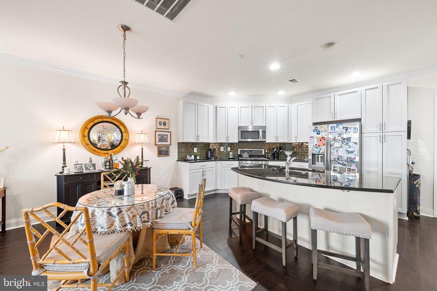 Welcome to Lawrence Place #2716. This dreamy upper level 1 bedroom, 1 bath condo with designated parking space sparkles with upgrades and style in the heart of Graduate Hospital. A massive updated kitchen with an abundance of white shaker cabinetry (including a pantry), a welcoming island (for more prep area and additional seating) and a stylish moss green backsplash is a show stopper as you enter this sun-drenched unit. Floor to ceiling windows, crown molding and espresso wood floors add even more character to the living and dining areas and the flexible 1 floor layout means the new owners can choose how they want to utilize the space. The spacious bedroom can accommodate a king sized bed as well as additional furniture and includes a walk-in closet and an oversized sliding door to the Juliet balcony, ideal for air-flow and light. The sizable bathroom offers room for storage, neutral tile and a bathtub. 2 large closets- 1 with stackable washer and dryer and additional coat closet round out the living space. This incredible condo in a pet-friendly, elevator building also includes a designated parking spot located directly in front of Lawrence Place and an additional storage locker. Enjoy top-notch amenities such as 24-hour security, bike storage, secure package delivery, and a pool and fitness center in the 20+ acre manicured grounds of Naval Square! This low maintenance condo is located steps from Giant Heirloom Market, Ultimo Coffee and the Schuylkill River trail and dog park. Walking or biking to work or school is a breeze as Graduate Hospital is convenient to Rittenhouse, Penn, Drexel, CHOP and 30th Street train station. Put down roots in one of Philadelphia’s most desirable neighborhoods. Schedule your showing today!