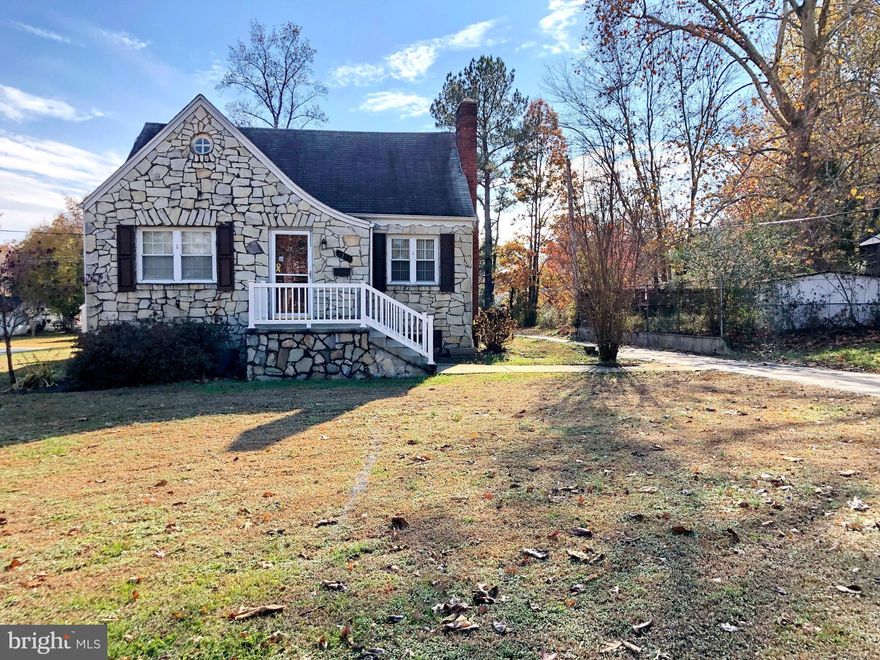 Welcome Home! Unique, beautiful stone home in Indian Head with large lot.   Hardwood flooring through out main level.  Updated kitchen w/ walk in pantry,  new counter top. Gas fireplace makes living room area nice and cozy . Upper level bonus room would make a great au pair or in-law suite, possible office. Spacious finished basement w/ bedroom and storage room.  Over sized 2 car garage w/ additional storage in attic area. The built- in wood burning fire pit w/ concrete patio is a nice touch to back yard.  Quiet neighborhood.  Property eligible for 100% USDA Financing for qualified buyers, no money down. Seller offering 1 year HSA Home Warranty