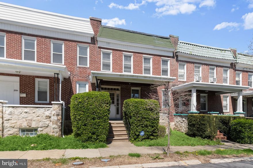 Welcome to 3012 Poplar Terrace – a beautifully renovated gem nestled in the heart of Baltimore City! This spacious 4-bedroom, 2-bath townhome perfectly blends timeless charm with modern upgrades, making it a true must-see.

Step onto the inviting, covered front porch and into a bright, airy interior freshly updated with new paint, plush carpet, and luxury vinyl plank flooring throughout. The main level offers a comfortable living room, a formal dining area, and a fully renovated full bath. The stunning kitchen features gas cooking, granite countertops, and access to a private balcony — perfect for morning coffee or evening relaxation.

Upstairs, you'll find four generously sized bedrooms, including one with its own balcony offering panoramic city views. A second renovated full bathroom completes this level.

The finished lower level adds even more living space, with brand-new carpeting, a dedicated laundry room, and access to the attached 1-car garage.

Outside, enjoy a friendly, walkable neighborhood with a tot lot just steps from your front door. This home has been lovingly maintained and is truly move-in ready.

Don’t miss your chance to own this exceptional townhome with all its modern updates and classic appeal — schedule your showing today!