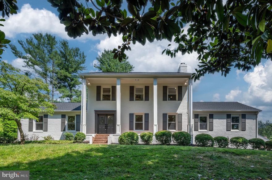 home back on market - no fault of seller.  Set on 1.1 acres surrounded by mature trees, this home offers the peace and privacy everyone’s looking for—yet you’re still just minutes from everything you need in a highly coveted community with no restrictions.

The stone pillar entrance and dual driveways make a statement, while the white-brick exterior and classic columned front porch set the tone for timeless curb appeal. The landscaping is complete with stone walkways and a private patio, creating an inviting outdoor living space perfect for morning coffee or weekend barbecues.

Inside, the open layout welcomes you home. The living room, dining area, and kitchen flow together seamlessly—ideal for everyday living and entertaining. The kitchen is brand new with stainless steel appliances, sleek cabinetry, and a modern layout that makes cooking enjoyable. Sliding doors open to the backyard extending your living space outdoors.

A custom tech center off the kitchen adds functionality for working from home, managing schoolwork, or relaxing with a book. The cozy family room with a fireplace sets the stage for movie nights or quiet evenings in. Upstairs, you’ll find four generous bedrooms filled with natural light and fully updated bathrooms, including a primary suite designed for true relaxation.

The fully finished walkout basement offers flexible space for a gym, theater, playroom, or guest suite with its own full bath and private entrance. 

Perfect for multigenerational families, move-up buyers, or investors, this home delivers comfort, flexibility, and value. Move-in ready, upgraded throughout, and waiting for your vision. Bring offers—motivated seller!