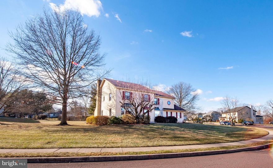 Welcome to 1016 Winding River Lane, a beautifully updated 3,205+ square foot Colonial ideally located just three miles from downtown Phoenixville dining and shopping, directly across from the scenic Black Rock Sanctuary, and minutes from the Schuylkill River Trail and Reservoir dog park.  This 4-bedroom, 2.5-bath home blends timeless design, extensive upgrades, and a lifestyle centered on comfort and nature.  Enter through the replacement leaded-glass front door into a grand two-story foyer with crown molding, hardwood floors, and a turned staircase.  The formal dining room features hardwood floors, chair rail, crown molding, and a sun-filled bay window.  The living room offers Brazilian Cherry (Jatoba) hardwood flooring, crown molding, custom built-in bookcases, and double glass doors opening to the family room.  The family room showcases Brazilian Cherry hardwood floors, recessed lighting, ceiling fan, stone fireplace with built-in wood storage box and mantel, and a wet bar with granite countertop and stainless steel sink.  The renovated kitchen features Wolf Classic Hudson Heritage maple cabinetry with pull-out shelving in the lower cabinets and built-in pantry, Ivory Brown granite countertops, a Black Galaxy granite island, mother-of-pearl backsplash, touchless motion-activated LED under-cabinet lighting, double stainless steel sink with brushed nickel gooseneck faucet and dual soap dispensers, a five-burner electric range with convection, touch-pad controls, and warming drawer, stainless steel microwave, KitchenAid dishwasher, stainless steel Insinkerator disposal, and a Haier beverage/wine cooler mini-fridge. The breakfast room includes chair rail, ceiling fan with dimmable light, and sliding glass doors to a composite deck. The main level also includes a powder room with hardwood floor, and a laundry room with upper and lower storage cabinets, deep sink, washer and dryer, replacement exterior leaded-glass door, and direct access to the oversized two-car garage. The garage features insulated Amarr Lincoln 2000 doors and an exterior keypad remote entry, leading out to the recently repaved driveway. Upstairs, the primary suite offers double-door entry, vaulted ceiling, ceiling fan with light, and a spacious sitting room. The primary bath includes double vanities, a jetted soaking tub, separate shower, linen closet, and a dressing area with an oversize mirror, built-in vanity complete with drawers and storage cabinet, and a large lighted walk-in closet. Three additional bedrooms feature ceiling fans, and the hall bath offers double sinks, a linen closet, and a shower/tub. Pull-down attic stairs provide access to the attic for extra storage. The finished basement includes recessed lighting, built-in counter and storage, multiple closets, a separate closed-off work area, and a large unfinished area for storage or future expansion. Major upgrades include a Westinghouse stainless steel water heater, York 16 SEER 5-ton heat pump with programmable WiFi thermostat, Eaton whole-house breaker and surge protector, 200-amp electrical panel, CertainTeed Landmark Pro roof, replacement tilt-in low-E, argon-filled windows, and updated hardwood flooring. Don’t miss the exclusive property website featuring a 3D Matterport tour, virtual walkthrough, floor plans, professional photography, and aerial drone footage. Some photos have been digitally enhanced. Enjoy a prime location, extensive upgrades, and easy access to outdoor recreation.
