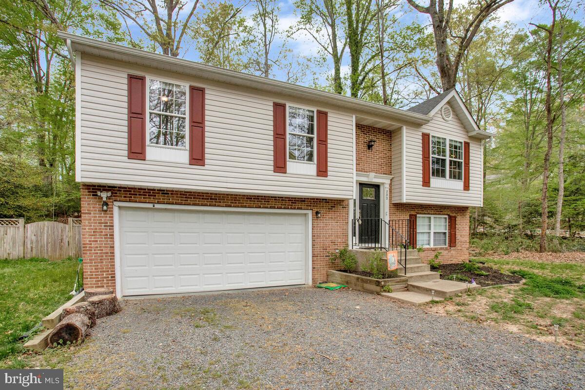 This Is The One! Welcome to Your Beautiful Home! This 2000+sqft, 3 Bedroom, 2.5 Bathroom Home underwent a full renovation in 2020, resulting in a modern and inviting living space. The charming curb appeal features a nice, neighborly, open front yard, fully fenced in rear year, ample driveway space, and a convenient 2-car attached garage.
Inside, you'll find a meticulously maintained interior with modern touches throughout. The spacious family room seamlessly flows into the dining area and upgraded kitchen, complete with white shaker style cabinetry, granite countertops, stainless steel appliances, and a movable island to add a bit more counter and storage space too!
The home offers three upper level bedrooms and two full bathrooms on the main level, each featuring updated vanities, tile flooring, and fixtures.
Downstairs, the lower level reveals an open concept layout with a spacious rec room, a half bathroom, and access to the oversized 2-car garage, with upgraded epoxy flooring and extra metal storage units .
With a newer architectural roof installed a few years ago, this home is move-in ready and awaiting its new owner!
The HOA has the Most Amenities in all of Southern MD with 2 (Additional) Private Sandy Beaches, with Facilities, a Private Lake, Clubhouse, Roving Security, a Full Campground/RV park with Facilities, a Private Functional Airstrip for our Pilots, Bike Paths, Community Gardens, Tot Lots, Basketball Courts, Baseball Field and so much more! WATER Surrounds this Community, as it sits On the Patuxent River with Chesapeake Bay Views and Breezes