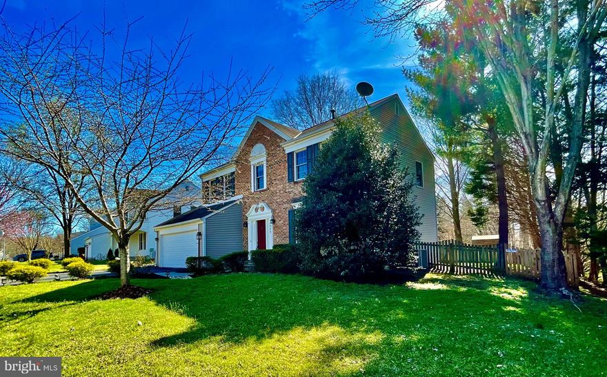 ********All offers due by Monday at noon!********* Welcome to this exceptional, well-maintained brick front colonial on premium private lot backing to wooded privacy on three sides! Numerous upgrades throughout! 9ft ceilings, flagstone entryway! Lasting character is found throughout from vintage door handles to subtle arched doorways. Custom closets designed by California Closets throughout. Fresh paint! Large living room & separate dining room w/custom moldings and beautiful hardwood floors! Spacious kitchen w/42in. cabinets, updated Corian-style counters, stainless steel appliances! Sun drenched breakfast room French door w/sliders lead to a huge deck that overlooks the backyard. The outside offers a lot of relaxed space to entertain with a fully fenced backyard including a large storage shed. Charming family room with hardwood floors, wood-burning fireplace and a custom tiled mantle! This home boasts a sensational owners suite with cathedral ceilings, walk-in closet custom designed by California Closets, and a huge owners bathroom with large tub and standing shower. Bedroom level laundry area  and linen closet make for ease of access from the four large upstairs bedrooms which include new Anderson windows and California Closets. Fully finished walkup basement contains additional bedrooms with new carpet, and a large rec room with ceramic tile. Fifth bedroom on the lower level makes for an ideal au pair suite with an attached modern bath. This property is strategically located with ease of access to shopping, restaurants, DC, Annapolis and Baltimore. ********All offers due by Monday at noon!*********