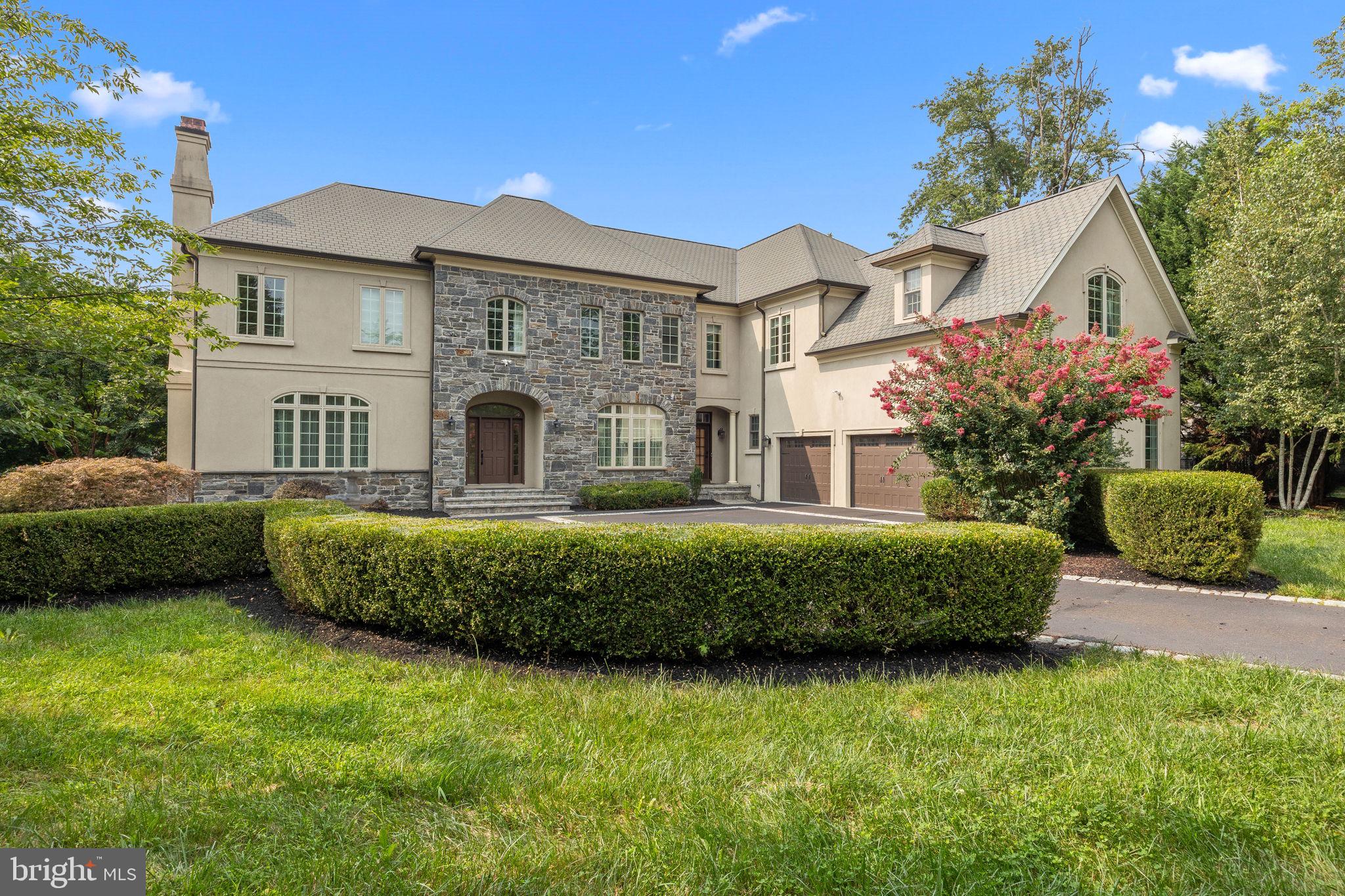 OPEN HOUSE!!!! SATURDAY AUGUST 16TH!!!12-2PM
Situated in one of Lower Moreland’s most desirable neighborhoods, this exceptional Huntingdon Valley home blends elegant design, top-quality finishes, and resort-style amenities. A grand two-story foyer welcomes you with a light-changing chandelier and beautiful custom tile flooring extending through much of the first floor. The elegant formal living room features an inviting gas fireplace with a new granite mantel and a large picture window, while the formal dining room is accented with a tray ceiling. The open-concept gourmet kitchen is a true showpiece — new custom cabinetry, high-grade granite countertops, top-of-the-line stainless steel appliances, a designer marble backsplash, and a large island with prep sink and seating. The breakfast area opens to a two-level patio, perfect for outdoor dining and entertaining. A spacious two-story great room with exposed wood beam ceilings and a wood-burning fireplace creates a warm gathering space. A large home office with hardwood floors, powder room, and mudroom complete the main level. Two staircases — main and secondary — lead to the second floor, now upgraded with new hand-scraped acacia hardwood flooring throughout. The owner’s suite is a luxurious retreat with tray ceilings, a sitting area, a new stone-clad divider with linear fireplace and TV hookup, and a huge custom walk-in closet with a window-side sitting area. The spa-like bath features a new custom double vanity with granite tops and vessel sinks, a makeup area, freestanding tub, stone floors, walk-in rain shower, and private toilet room. Three additional large bedrooms each have their own bathrooms. A laundry room, playroom, and study area complete the upper level. The enormous, finished walkout lower level offers endless entertainment possibilities, featuring a granite-topped bar, built-in cabinetry, multipurpose gaming and fitness areas, a full bathroom, and a splendid home theater. The lavish exterior is designed for pure enjoyment — a multilevel travertine-tiled patio surrounds a gorgeous renovated heated pool with custom waterfall and whirlpool. Recent upgrades include new plaster/coating, new pump, new salt converter, new custom cover, and new lighting. A gazebo, built-in sauna house with cozy rest area, fenced play/pet area, and storage shed complete this private oasis. Additional highlights include: a finished three-car garage with new floor coating, recently coded driveway with Belgian block inserts, new security system with two pads, dual HVAC systems with four zones, built-in speakers, abundant closet space, and large windows that flood the home with natural light. Prime location in the heart of Huntingdon Valley, with an easy commute to Philadelphia, Princeton, New York, I-95, the Turnpike, and Route 1.