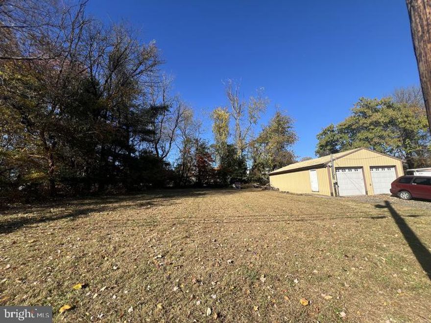 Beautiful .39 acre land with a 984 SF garage with electric and 9' high ceiling. Located in an R-2: Medium Density Residential District. Public water and sewer hook up nearby. It can be used for equipment storage and vehicle parking. For residential building requirements. Lot size: 11,250 SF. Lot Width: 75 Feet. Street Frontage: 50 feet and 35 feet at cul-de-sac. Building Coverage: 25% max. Impervious Surface: 35%max. Setback-Front Yard (Feet) 35 (interior), 35 (corner). Setback Sides (Feet) 15 each. Setback Rear Yard (Feet) 50. Square footage (Approx.) 16,950 SF .39 Acre.
