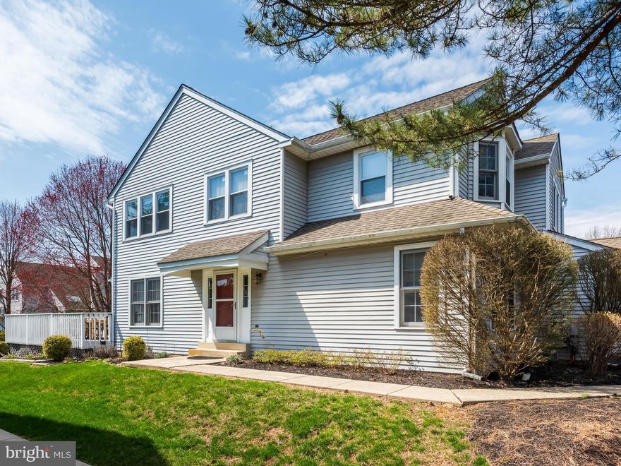 Welcome to 108 Cross Country Court, a beautifully maintained 3 bedroom, 2.5 bath end-unit home nestled in a desirable North Wales community. This home is located on a quiet cul-de-sac with 11 additional parking spaces a few yards away from the front door. This inviting residence offers a perfect blend of comfort, space, and thoughtful updates throughout. The sun-filled living room boasts four windows, crown molding, and recessed lighting, creating a warm and elegant setting. The dining room is equally impressive with three windows, crown and chair rail moldings—perfect for entertaining. The first floor features a convenient powder room and a spacious eat-in kitchen complete with white cabinetry, ample counter space, stainless steel appliances, gas cooking, pantry closet, and recessed lighting. Just off the kitchen, the bright and airy family room showcases vaulted ceilings, skylights, wood laminate flooring, ceiling fan, two windows, and sliding doors that lead to a wrap-around deck and outdoor space—ideal for relaxing or hosting guests. A main-floor laundry room with cabinetry and a storage closet provides added convenience and direct access to the one-car garage. Upstairs, the primary suite offers three windows, a walk-in closet, additional double closets, and a private bath with dual sinks, garden tub, and separate shower. The second bedroom is generously sized with four windows and a double closet, while the third bedroom features two windows and sliding closet doors. The full basement offers exceptional flexibility—perfect for a home gym, hobbies, entertaining space, and abundant storage. Recent improvements include: 2023 – new carpeting, 2024 – some new windows & refrigerator, 2025 – new garbage disposal, dryer, microwave, and water heater. Conveniently located near shopping, dining, and major roadways, this move-in ready home is a must-see! Click on the movie camera icon for a slideshow of this home. Welcome home!