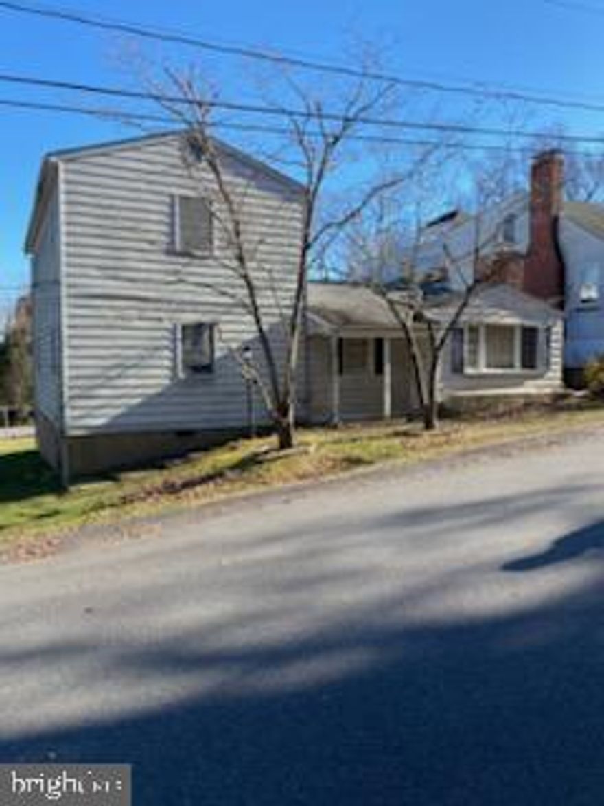 Close to the Bay.  View from the property.  Needs work.  An unbelieveable private community KENWOOD BEACH.  If you want a great property, this is it!!!