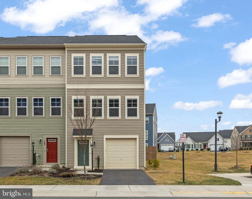 Newly painted with a Fenced in Yard!  Why wait for new construction? 
3 years old- End unit 3-bedroom townhouse offering 2 full baths and 2 half baths with a versatile layout across three finished levels.  
Carpets just cleaned professionally. The entry-level features a finished recreation room and a convenient half bath—ideal for a home office, gym, or guest space. The main level boasts an open floor plan with a bright living room, well-appointed eat-in kitchen, and half bath. The kitchen includes granite countertops, stainless steel appliances, table space, and a pantry. Upstairs, the spacious primary bedroom offers a walk-in closet, and the bedroom-level laundry room adds everyday convenience. One-car garage plus a convenient extra parking area next to this property. Enjoy exceptional community amenities including a swimming pool, walking and biking trails, indoor tennis courts, volleyball courts, clubhouse, picnic areas, and more. Convenient commuter location close to I-81 and Route 11. New washer 2025.