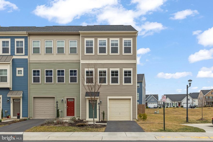 Newly painted with a Fenced in Yard!  Why wait for new construction? 
3 years old- End unit 3-bedroom townhouse offering 2 full baths and 2 half baths with a versatile layout across three finished levels.  
Carpets just cleaned professionally. The entry-level features a finished recreation room and a convenient half bath—ideal for a home office, gym, or guest space. The main level boasts an open floor plan with a bright living room, well-appointed eat-in kitchen, and half bath. The kitchen includes granite countertops, stainless steel appliances, table space, and a pantry. Upstairs, the spacious primary bedroom offers a walk-in closet, and the bedroom-level laundry room adds everyday convenience. One-car garage plus a convenient extra parking area next to this property. Enjoy exceptional community amenities including a swimming pool, walking and biking trails, indoor tennis courts, volleyball courts, clubhouse, picnic areas, and more. Convenient commuter location close to I-81 and Route 11. New washer 2025.