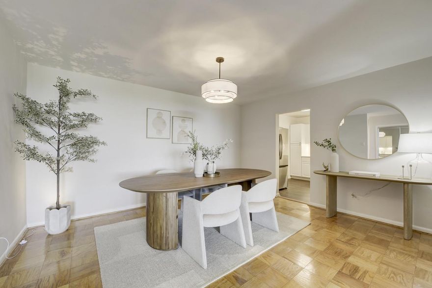 Welcome to 5101 River Road #1116: a wonderful opportunity to own a beautifully refreshed, turnkey residence in the sought-after Kenwood condominium. Offering approximately 1,360 square feet of light-filled living space, this two-bedroom, two-bath home combines generous proportions with a clean, modern aesthetic.
The expansive living and dining areas are filled with natural light and open seamlessly to a private balcony with views of the National Cathedral:  the perfect place to start or end your day. The well-designed layout provides excellent flow for both everyday living and entertaining.
The brand-new kitchen is a standout feature, thoughtfully renovated with all new cabinetry, stainless steel appliances, updated countertops, and modern lighting. Newly refinished floors and fresh paint throughout create a bright, cohesive feel, while both bathrooms have been tastefully refreshed with updated lighting.
The spacious primary suite offers ample closet space and an en-suite bath, while the second bedroom provides flexibility for guests, a home office, or den.
Additional highlights include an assigned garage parking space (#175), a dedicated storage unit, and a monthly condo fee that includes all utilities, offering exceptional convenience and value.
Residents of The Kenwood enjoy a full-service lifestyle with 24-hour concierge and fitness center.  Don’t want to host a party in your home?  Use the Kenwood Room, which includes a big screen television, plenty of table seating and standing room, bathrooms, and a kitchen. Outdoor amenities are abundant: a heated outdoor pool and deck, and the promenade is a beautifully landscaped area including a walking path, gas grills, and plenty of benches and seating areas.
Ideally located just moments from the shops and conveniences of Kenwood Station, including Whole Foods, Sarah’s Handmade Ice Cream, Ledo Pizza, and Georgetown Bagelry, as well as the evolving Westbard Square, this home offers easy access to Friendship Heights, downtown Bethesda, and the Capital Crescent Trail for walking, running, and biking.
Turn-key, well-appointed, and perfectly located—this is easy living at its best.