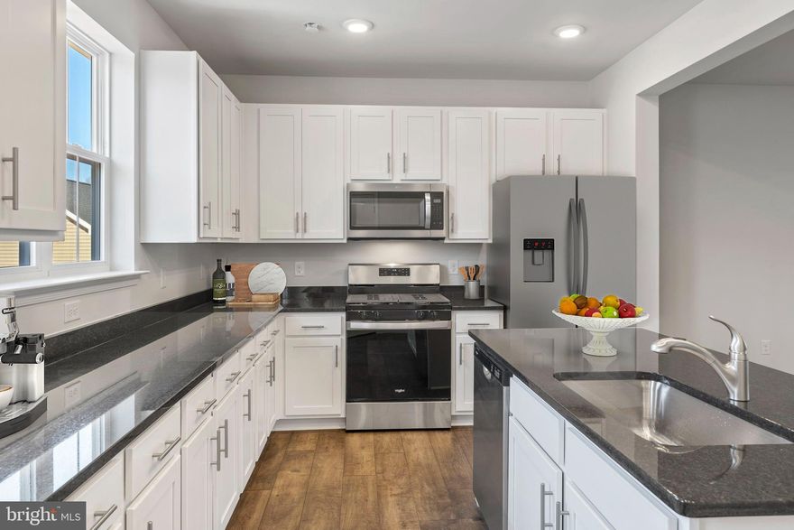 Enter the charming Victoria townhome and be welcomed by a bright and airy living space.  This well-designed home flows seamlessly from room to room, meaning you will never miss a moment with family and friends!  Prepare a meal on the large kitchen island to serve in the adjoining dining room or enjoy a movie night in the spacious family room.  The open first floor also includes sleek stainless steel kitchen appliances, gorgeous granite countertops with tile backsplash, beautiful laminate hardwood flooring throughout including the powder room.  Upstairs, you will find the generously sized Owner’s Suite with a walk-in closet, two additional bedrooms, two full bathrooms and a laundry.   Additional highlights to this home include a spacious front porch for outdoor retreat and a detached garage!

Featuring new designs, inside and out, your brand new townhome at Perry Mill by THP Homes awaits you with open arms, in the charming, quaint town of Perkasie!  Each thoughtfully designed home features 3 bedrooms, 9’ first floor ceilings, granite countertops, stainless steel appliances, laminate flooring on the 1st floor, a classic brick exterior with a sizeable front porch and a detached garage!
Located downtown, you are within walking distance to many eateries, shops and multiple parks.  Pick up fresh brewed coffee from the café a block away to enjoy on your front porch or have a fun night dining out with friends at the local pint house - located several minutes from your new home!  Start your weekends off by taking a short walk to the local Farmer’s Market on Saturday morning to pick up fresh produce or flowers to display on the large island in your beautiful new kitchen!
Perry Mill is centrally located between Doylestown and Quakertown in Bucks County.  There are great educational offerings within the highly ranked Pennridge School District and exceptional universities within commuting distance!