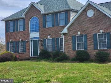 Corner lot, brick front colonial with many amenities to provide the home you have been seeking. This home has a side load 2-car garage, kitchen has upgraded cherry cabinets, stainless appliances, island and pantry. The owner's suite has a large soaking tub to soothe the body after a day's activities and two large closets. The lower level offers that extra space with a recreation room, bar, full bath and two bonus rooms. The gorgeous back yard with a unique concrete patio and low maintenance fence for privacy equals fun, entertaining and relaxing . Solar panels are recently installed and paid for. The home is sold "AS IS" and the price is adjusted to allow for any repairs. Conveniently located to military bases.
