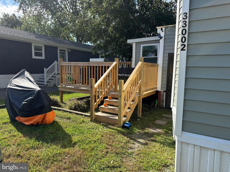 This three-bedroom, one-bath home is full of potential and located right off Long Neck Road, just minutes from area beaches. Renovations have already been started, giving you a great head start to add your finishing touches and make it your own. New deck and living room roof only a few years old. With low lot rent of only $625 a month, this property is an affordable option as a perfect starter home, a beach getaway, or even an investment opportunity. Don’t miss the chance to bring this home back to life in a fantastic location.