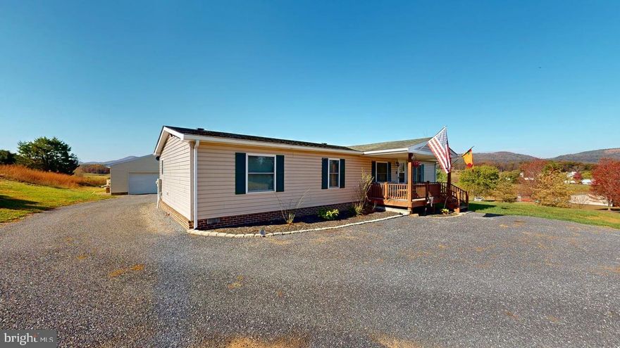 Well-Maintained Home with Mountain Views on 2.3 Acres!
Move right into this charming 3BR/2BA home with beautiful mountain views from both the front and back porches. You’ll love the many updates—solid wood accents, new flooring, energy-efficient windows, additional space off the primary bedroom that would make a great setting room, private office space or a nursery and so much more. The spacious heated and cooled garage is perfect for projects, plus there’s plenty of extra storage in the sheds. A fenced dog area with water makes it great for pets, too. Peaceful country living, ready for you to move into and call home!