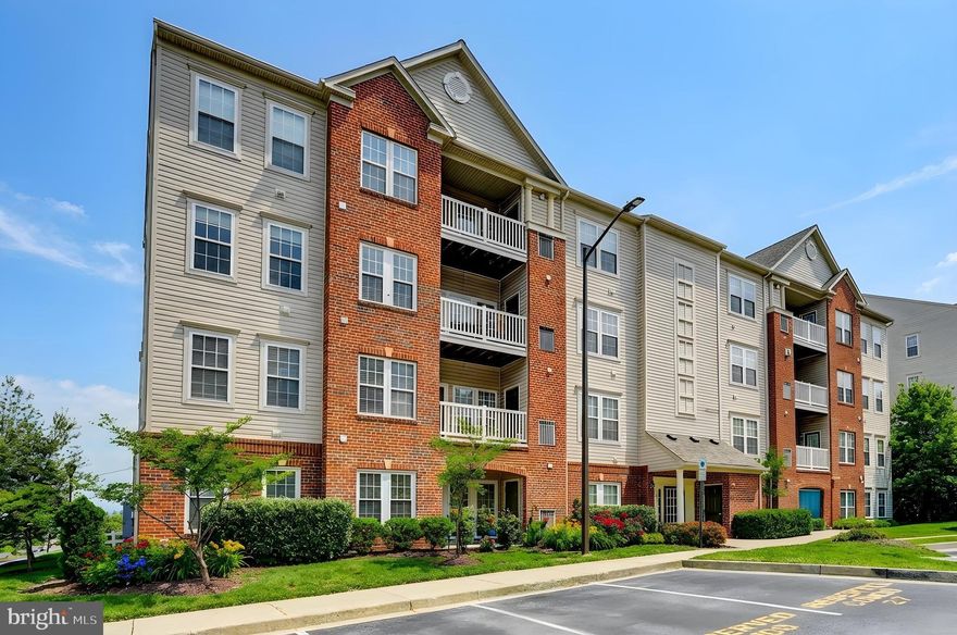 Don't Miss This Gorgeous Main Level Condo!!!!  Freshly painted throughout! Spacious kitchen with Lots of Cabinet & Counter Space & New Stainless Appliances (Gas Stove, Dishwasher Microwave, Refrigerator is only a couple of years old). Large open concept Dining Room & Living Room with Private rear entrance that leads out to charming rear patio (great for pets).  In-wall surround sound speakers, which include speakers outside on the patio. Screen pocket door for patio that is perfect for fresh air and a nice breeze.  Large Bonus Room with French Doors can be used as an Office, Guest room, Den, or Nursery & Could be easily converted into a third bedroom. Wood floors in open living area, ceramic tile in kitchen and bathrooms, carpet in bedrooms. Primary Suite with abundant natural light, walk-in Closet, large En Suite with Double Vanity w/ Large Linen closet, Stand up shower, and Jacuzzi tub. New HVAC in 2022. 2nd Bedroom has it's own full Bath with Tub/Shower & Linen Closet.  Full Size Washer & Dryer in Unit.   Secure Building Entrance with Lobby.  Walking distance to Shops & Restaurants.