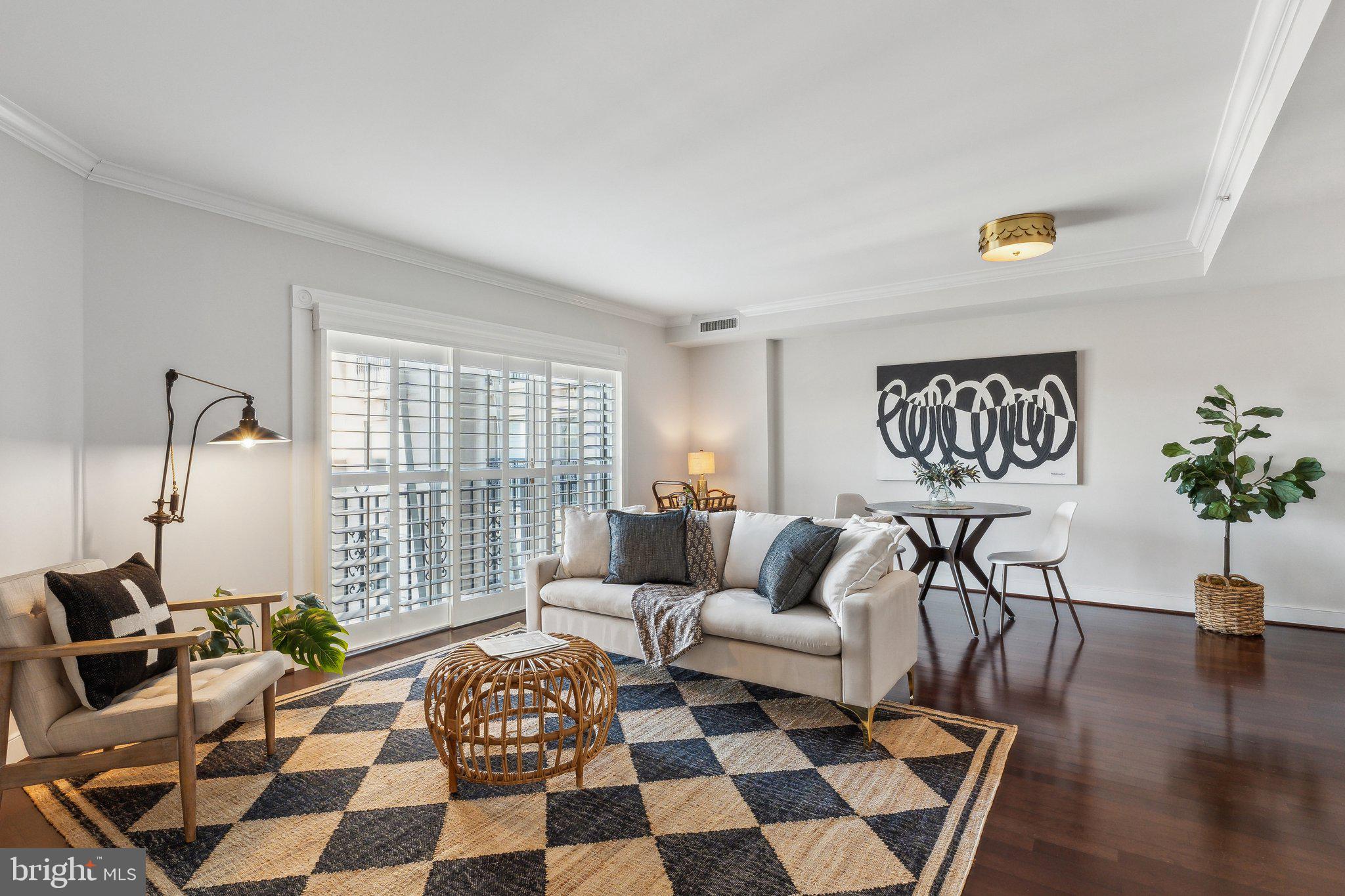 Pay no attention to the days on the market; this spectacular condo has been completely refreshed with new paint and a new price, and you will not be disappointed!!! Move right in and enjoy the fabulous downtown Annapolis lifestyle in this meticulously maintained 2bdr/2bath unit in the amenity-rich upscale community of Park Place! As you walk through the unit's front door, you will quickly realize how turnkey this home is - high-end countertops and appliances, breakfast bar/kitchen-island seating, moldings, plantation shutters, and beautiful and immaculate wood floors immediately greet you. The open-concept kitchen/living area with tons of beautiful natural light is inviting and the perfect place to relax and enjoy. As you continue through the unit, you will be blown away by the detail that went into all the updates. Both bedrooms offer fresh carpet, fresh paint, tasteful wallpaper, and newly added plantation shutters. Not to mention BOTH the primary and secondary full bathrooms have been totally and tastefully renovated. Other updates include a new washer/dryer and a newer HVAC (2019). The owners have spared no expense and have taken exquisite care of this beautiful home -- 514 is truly ready for you to MOVE RIGHT IN! The icing on the cake is the 2-PRIVATELY OWNED PARKING SPACES convey!!! The parking is ideally located immediately inside the garage entrance and steps from the elevator. Community amenities include an in-ground swimming pool, hot tub, front concierge desk & security, dog park, and so much more! Come look at all this unit offers - you will not be disappointed!!!!