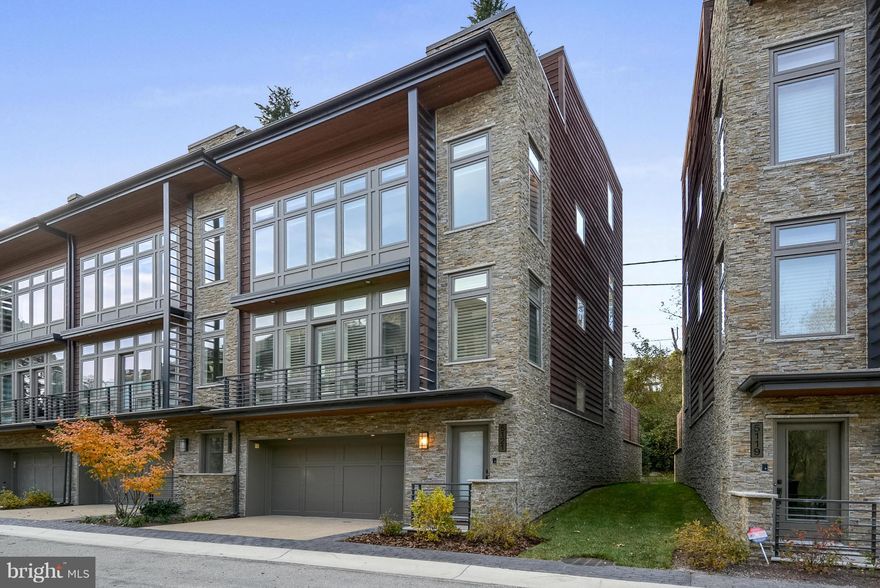 ONE OF THE BEST LOTS IN LITTLE FALLS PLACE! 3BR, 2FB, 2HB End Unit w/Gourmet Kitchen; Sep DR & Office; Spectacular Rooftop Terrace backs to Capital Crescent Trail w/2 privacy walls, stainless/quartz outdoor kitchen, gas FP, accent lighting, retractable awning & shade, and 10' trees on roof perimeter! Custom plantation shutters/honeycomb blackout shades * Elevator * LEED Cert * VISIT VIRTUAL TOUR!