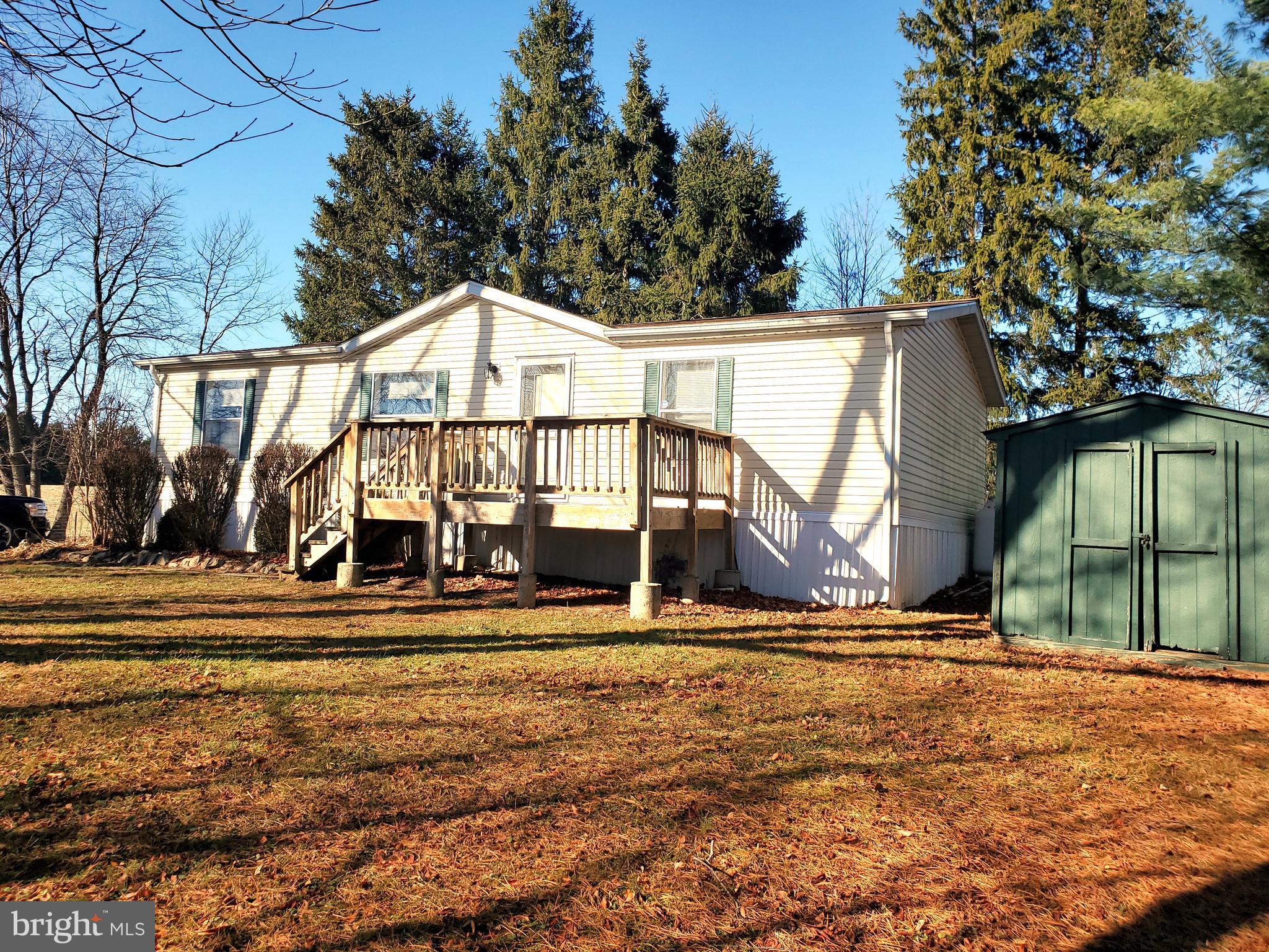 Charming 3-bedroom, 2-bath Single floor home nestled in the serene countryside. This cozy home features a well-equipped kitchen with ample cabinetry, an open living area with natural light, and a spacious living room. Enjoy the convenience of in-home laundry and the peaceful outdoor deck, perfect for relaxing or entertaining. Minimum credit score 625.