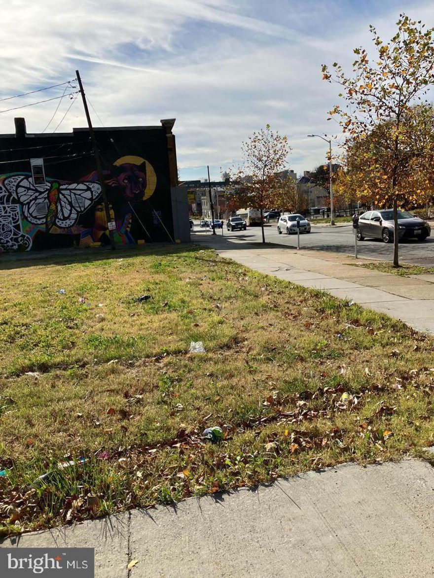 Development opportunity in prime location! Zoned R-8, this unimproved lot is 90 feet deep and 15 feet wide totaling 1,350 square feet. Current proposal for three 2-bedroom dwelling units and five basement level commercial suites. Zoning, floor plans, scope, and budget all available upon request