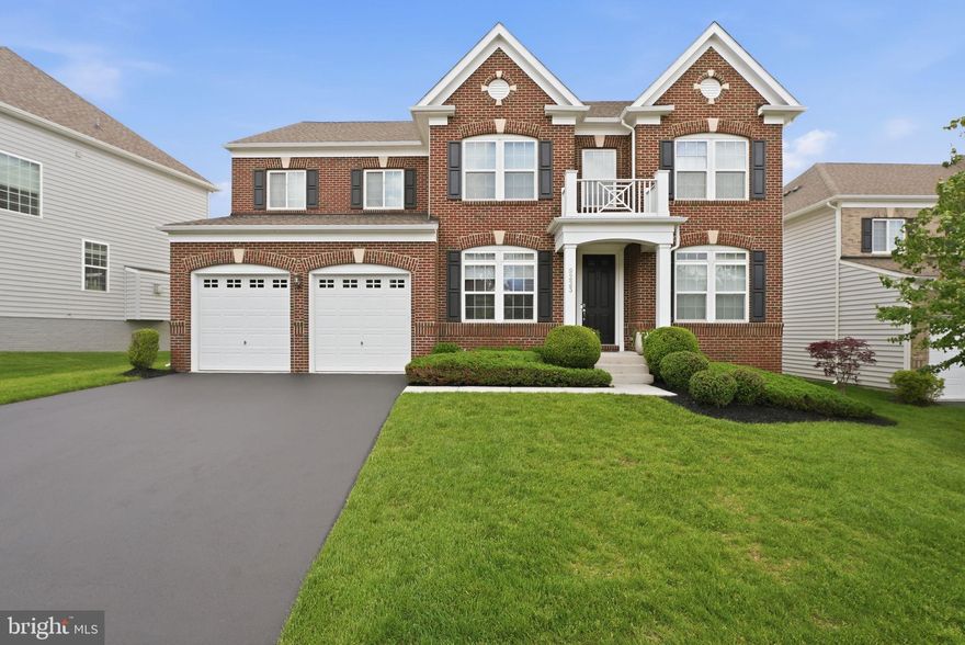 Welcome to 9223 Clementine Ct — a refined, spacious home tucked into a quiet cul-de-sac in sought-after Lorton, where privacy, design, and convenience come together effortlessly.

Set against a backdrop of mature trees, this home offers a rare sense of seclusion while still being exceptionally well-connected. Inside, natural light pours through the home, highlighting the open, well-designed layout and rich wood flooring that carries across the main level.

At the heart of the home, the kitchen delivers both style and function with a large center island, double ovens, and updated lighting — perfectly suited for everything from casual mornings to hosting at scale. The adjoining sunroom and family room create a seamless flow of living space, ideal for both everyday comfort and elevated entertaining.

Upstairs, the primary suite offers a true retreat, complete with custom blinds, including blackout shades for added comfort and privacy. Additional bedrooms provide generous space and flexibility for guests, work, or family living.

The finished lower level is designed to impress, featuring a custom bar and entertainment area that elevates the home’s hosting potential and adds a sophisticated edge.

Outdoor living is equally compelling, with a full deck featuring stairs and integrated lighting — perfect for evening gatherings or quiet moments overlooking the tree-lined backyard. The added privacy and established landscaping, supported by a full irrigation system, enhance the overall setting.

What sets this home apart is the combination of scale, thoughtful upgrades, and the polished yet comfortable feel throughout — a home that lives as well as it looks.

Ideally located with quick access to the Virginia Railway Express, Interstate 95, Fort Belvoir, and the Amtrak Auto Train Terminal, this location offers seamless connectivity without sacrificing tranquility.

A standout home offering space, style, and a setting that’s hard to replicate.