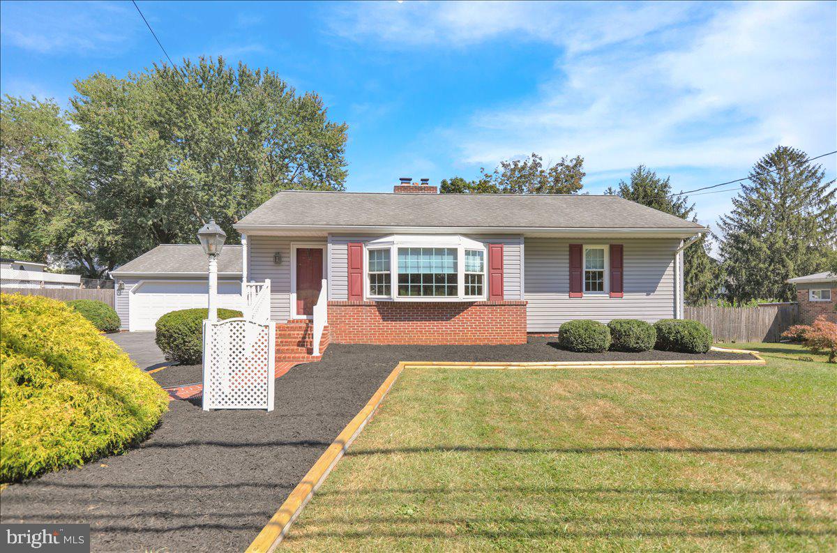 Welcome home to this adorable well maintained 3 bedroom, 2 bath one-story home! Beautiful hardwood floors throughout the first floor, living room/dining room combination with a decorative fireplace and built-in corner cupboard, and a finished lower level family room with a gas fireplace and full bath are just a few of the features you will enjoy. Outdoors you will find a spacious screened in patio, fenced-in backyard, separate storage shed, plus a large 2-car garage! Conveniently located close to Rt 30 and Cool Creek Golf course. Schedule your showing today!