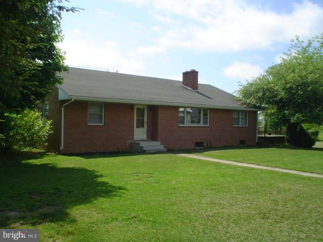 BEAUTIFUL REFINISHED WOOD FLOORS THRU OUT. ALL ROOMS NEWLY PAINTED. Brick, 4 Bed., 2 Bath, Living with F/P, Lrg. Eat in Kit., Lots of Cabinet Space, 2 Car Garage, 24X28 Concrete Patio, Full Basement, 2 Heating Systems, Oil Hot Water Heat & Elec. Forced Hot Air & Central Air., Copper Plumbing, Situated on 2 Lots & Includes 3rd Sep. Lot. FANTASTIC LOCATION. MUST SEE. REDUCED AGAIN TO $149,000