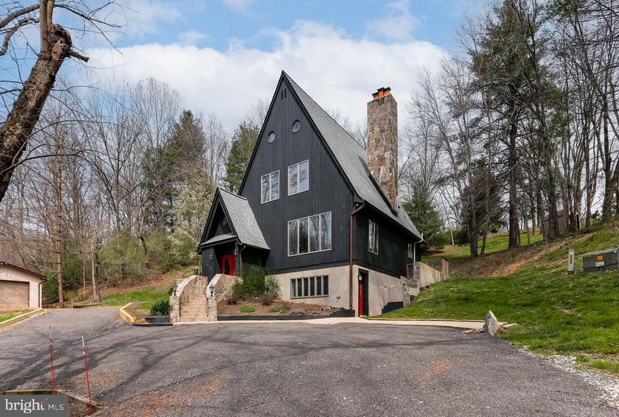 This 3 bedroom 3 full bath A-frame home has so many interesting features that you won't want to miss.  Situated on a private lot with a peaceful setting surrounded by nature. Enjoy tall ceilings, tons of natural light, hardwood floors, two fireplaces including a wood-burning stove.  The living room on the main level boasts a beautiful stone fireplace, new carpet, and a wood-accented vaulted ceiling.  Full laundry room off of kitchen which has updated appliances and a large island. The owner’s suite on the upper level features a completely remodeled bathroom,  a wood-burning fireplace, and a loft area into the large and functional attic. The finished basement is a great place to hang out with large sitting area, full bathroom and a bar area.  This home has plenty of privacy but is still within minutes of Main Street Sykesville and major commuting routes.  Tenants responsible for full yard and trash pick up.