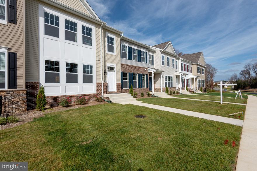 One of ONLY 5 Remaining New Construction Townhomes in Sought After Clark's Rest! Immediate Delivery Home with a $25,000 Incentive + NEW FREE 10'X24' Composite wood deck with vinyl rails! Incentive can be used towards closing, rate buy down, or options! Purchase with $0 out of pocket!! Why would you buy a re-sale home and have to worry about repairs/maintenance when you could own a brand new home for the same price! This 3 bedroom 3.5 bathroom townhome feels like a single family with almost 2400 finished sqft. Notable features include granite countertops, 9’ ceilings, open floorplan, tile shower/tub surround in the primary bedroom, a large walk in closet in the primary bedroom, LVP flooring & more! All of the rooms are spacious! The 2-car garage is oversized! The private driveway fits 4 cars! Clark’s Rest offers the largest townhomes with the most parking and open space! Neighborhood includes a village green, clubhouse/pool & a playground! Live the Leonardtown Lifestyle and use the Trolly to head into town and enjoy all of the shopping/dining/entertainment! This sizeable home partnered with all that the neighborhood and surrounding area has to offer is definitely worth a look! 6 additional units to choose from! Come and check them out at one of the open houses this weekend Saturday and Sunday from 11-2! Prices of other Units Range from $399,900 - $456,900 (End Unit)!