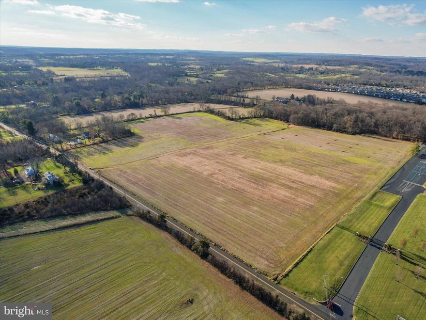 SOLD! NO LONGER AVAILABLE. Here is your chance to own 32.56 acres with over 1,000 feet of frontage in highly sought after Buckingham Twp! Along the western and northwestern property lines, runs a ribbon of mature trees with some wooded areas, creating the ultimate backdrop of sunset views from your backyard. Currently actively farmed under Act 319 preferential tax treatment, this open, and flat lot is in a much desired location and surrounded by other large parcels. Adjacent is a 76-acre homestead while across the street is another property of nearly 100-acres. Choose to keep the property as one parcel where you build your luxurious brand-new home. Continue to rent a portion to a local farmer or choose to create that farm you've always envisioned.  Or...  subdivide the property into two parcels. With this option, you can build your home while using the sale of the other parcel to defray the costs for your build. A feasibility study has been completed by the current owner, who has started the process for a possible 2-lot subdivision. Whether you decide to keep the sum of the acreage or divide into two homesites, you can enjoy the beauty that makes Buckingham Township great and create your own utopia! ***Site plan for 2-lot subdivision attached is CONCEPTUAL ONLY and is not approved.