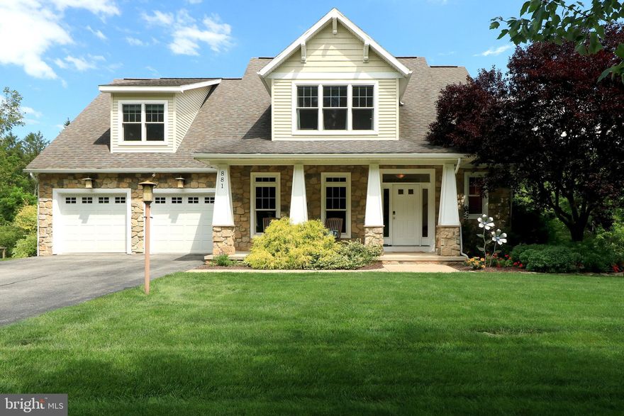 Quintessentially Craftsman in desirable Teaberry Ridge!  Wonderfully situated within walking distance to Penn State on a beautifully landscaped 0.4 acre lot with greenspace to the front and greenspace and a bike path to the rear means you'll enjoy this private setting so close to campus and downtown State College.  Appreciate craftsman features including a partial stone facade, large welcoming porch with tapered columns, and a large gabled dormer with corbels outside, as we well as rounded drywall corners, arches, plentiful wood flooring, mission styled cabinetry and railing system, and craftsman lighting inside.  Enter into an inviting foyer that leads to the spacious, two story great room complete with abundant windows, a gas fireplace with stone hearth, and plentiful recessed lights.   The sizable kitchen, which is open to the great room, boasts quality, Rosewood cabinetry, a festive tiled backsplash, solid surface countertops, undercabinet and task lighting and a breakfast nook with access to the deck.  Convenient for one-floor living, the main floor owner's suite features wood flooring, a tray ceiling, access to the deck, and a large owner's bath with a tiled shower, jetted tub, heated tile flooring, his & hers vanities, and a walk-in closet.  Upstairs find thoughtfully laid-out bedrooms and a Jack & Jill like bathroom setup, offering a private sink area in one bedroom and hall access to another sink area for the other two bedrooms.  Have fun in the finished walk-out lower level complete with a family room with recessed lights, surround sound, and a wet bar area with wine racks, an office nook, a fifth bedroom, a full bath and a sizable laundry room with folding countertop and storage cabinets.  The massive mechanical room provides for ample storage and a great workshop or hobby space.  Relax on the elevated deck (to be stained by August 25th) taking in the mature trees beyond and private yard, or hangout on the lower level covered patio or on the firepit patio.  Walking distance to Radio Park Elementary, Penn State Golf  Courses, campus, and downtown State College, plus nearby North end grocery stores, shopping, and restaurants.  Comfortable styling and modern construction & features in a wonderful neighborhood  so close to campus makes for the perfect combination!