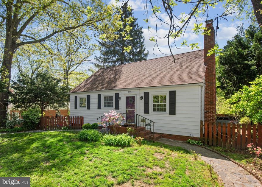 Step into this charming updated 3-bed, 2.5-bath Cape Cod, nestled in the highly sought-after Northwood Park community just steps to grocery stores/restaurants and public transportation. This immaculately maintained home boasts gleaming hardwood floors throughout main and upper levels. The renovated gourmet kitchen is the heart of this home showcasing white cabinets, butcher block wood countertops, stone backsplash, a large double sink and stainless steel appliances including cooktop with sleek hood. Enjoy your morning coffee in the adjacent breakfast area or near the cozy wood burning fireplace in the spacious living room. French doors from the dining area lead to the enclosed patio, perfect for evening relaxation or entertaining dinner guests. Primary bedroom is conveniently located on the main level offering great lighting and updated full bath nearby. Upstairs, the second level boasts two spacious bedrooms with skylights and a shared full bath with walk-in shower. The finished basement is a versatile space, complete with a built-in wet bar, large rec room, laundry room with extra storage space, and a convenient half bath, the ideal layout for a media room to enjoy a movie night in. Host summer BBQ’s in the large fenced rear yard featuring a built-in firepit surrounded by mature trees and ample space for outdoor gatherings. A one-car detached garage with a driveway offers off-street parking via the rear alley. Recent updates include: new roof (2021), water heater (2021), Radon abatement system installed (2021), new double-pane windows, and kitchen's electrical system, insulation, gas line, and HVAC line have all been meticulously updated to code for peace of mind. Enjoy the exceptional location within a short distance to local parks and the Park & Ride Metro station. Near Montgomery Knolls (PK-2) and Pine Crest (3-5) elementary schools. Existing VA loan with an interest rate of 2.75% offers potential for huge savings if assumed by qualified buyers! Don’t miss the opportunity.