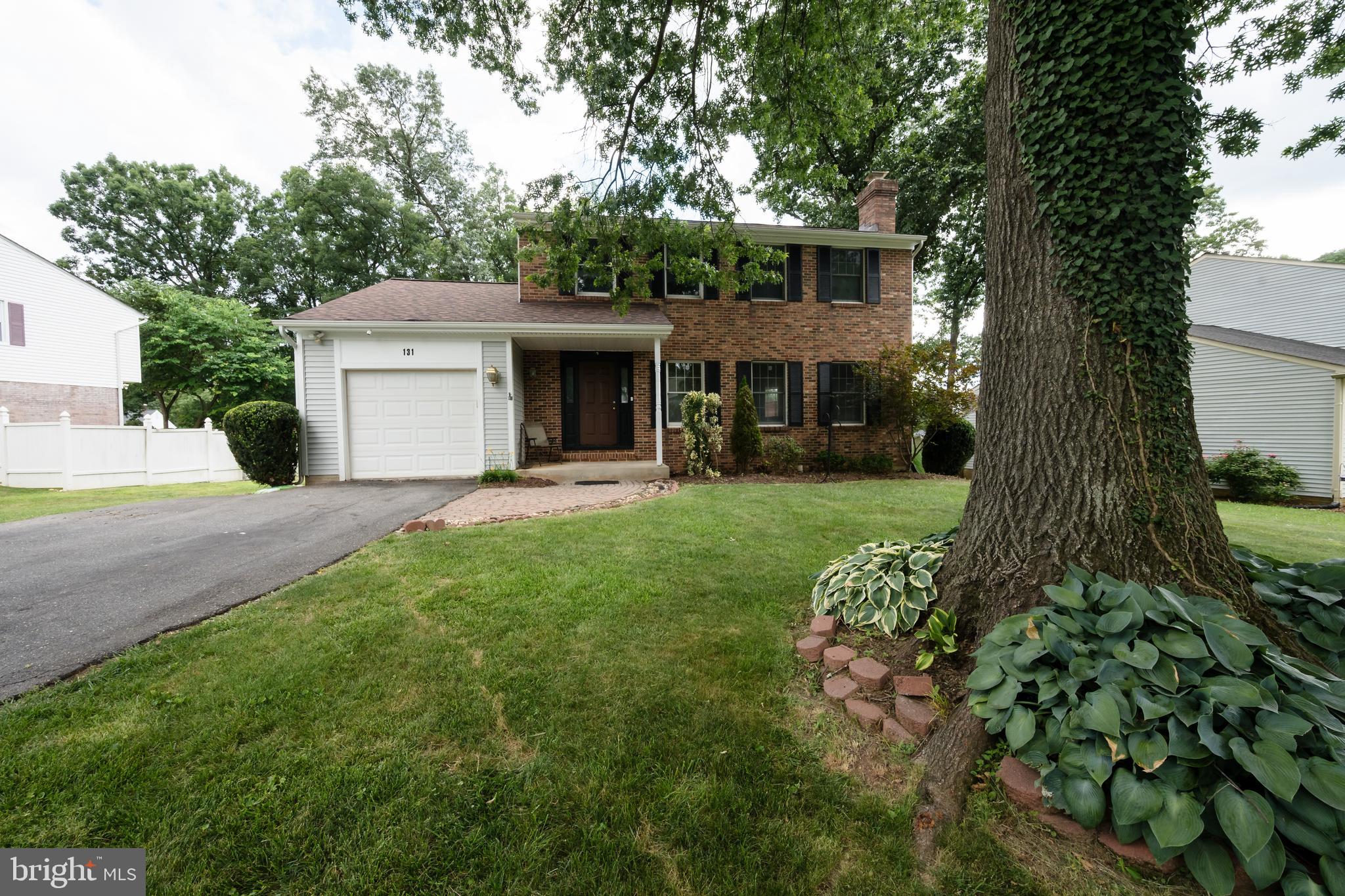 This is a beautiful home that has lots of extras! 4 bedrooms and 3.5 baths with an attached garage. The kitchen has granite countertops, stainless steel appliances and ceramic tile floor. There's an amazing great room that leads to the 2 level deck and that leads to a spacious backyard that has lots of entertainment possibilities. The lower level has a large family room with a wood burning fireplace plus a bedroom, full bath and storage area. It's convenient to shopping, dining, schools and hospital. Must see!