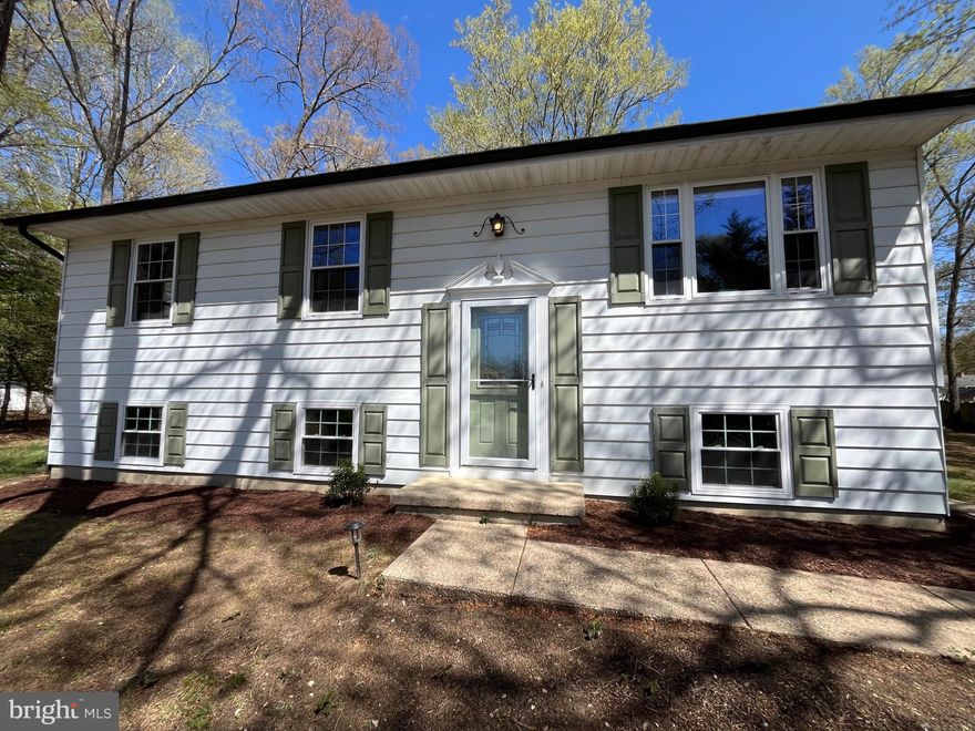 Coming Soon. An affordable oasis in a very prestigious zip code!  Patuxent Manor, also known as Riverwood, is surrounded by protective rural zoning, a golf course, old growth forest, Kings Branch (a tributary off the  upper reaches of the Patuxent River), million dollar homes, and horse farms!  There is even a county park with tennis, pickleball and handball courts, playground, a pavilion and ballfields right in the community.  First time on the market which is not unusual in this neighborhood because this is the type of community where people put down deep roots and stay.  Look around and you'll notice that homeowner's often expand versus leaving! Desirable schools and unbeatable access to the DC metro area are just two of the reasons. But no worries...if you don't want to rub elbows with neighbors, this home boasts a lot size just a hair under 1/2 acre with a huge backyard.  A brand new heat pump (inside and outside units) was installed this past November.  Replacement windows,  updated kitchen, original solid oak hardwood floors, brand new custom exterior steps to the back yard.