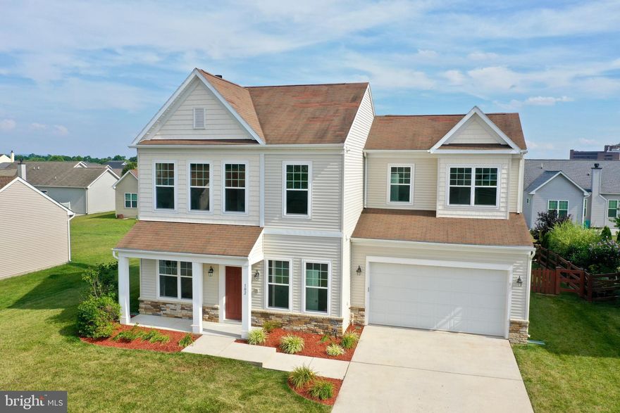 This pristine colonial home features an open floor plan with numerous upgrades, including new luxury vinyl plank (LVP) flooring and carpet. The main level boasts wide-plank hardwood floors and 10 ft. ceilings.  The gourmet kitchen offers granite countertops, black energy-saving appliances, and 42 in. cabinets. Enjoy the cozy wood-burning fireplace that also has an electric insert.

The second level includes an exquisite master suite with a walk-in closet and a master bath with a double vanity, jetted tub, and ceramic tile floor. A convenient second-level laundry space adds to the home's functionality.  3 additional bedrooms on the upper level including a large 4th bedroom over the garage.

Outside, enjoy the large stone patio, perfect for entertaining, within the extensively landscaped yard. The property is enclosed with a beautiful mortised split-rail fence, great for animals or families adding to the home's charm and privacy.

Located in a great commuter location close to Rt. 9 and 81, and minutes from VA, Coast Guard, ATF and, the IRS facilities. This home is as gorgeous as the day it was built and ready for you to move in. Don't miss out—schedule a viewing today!