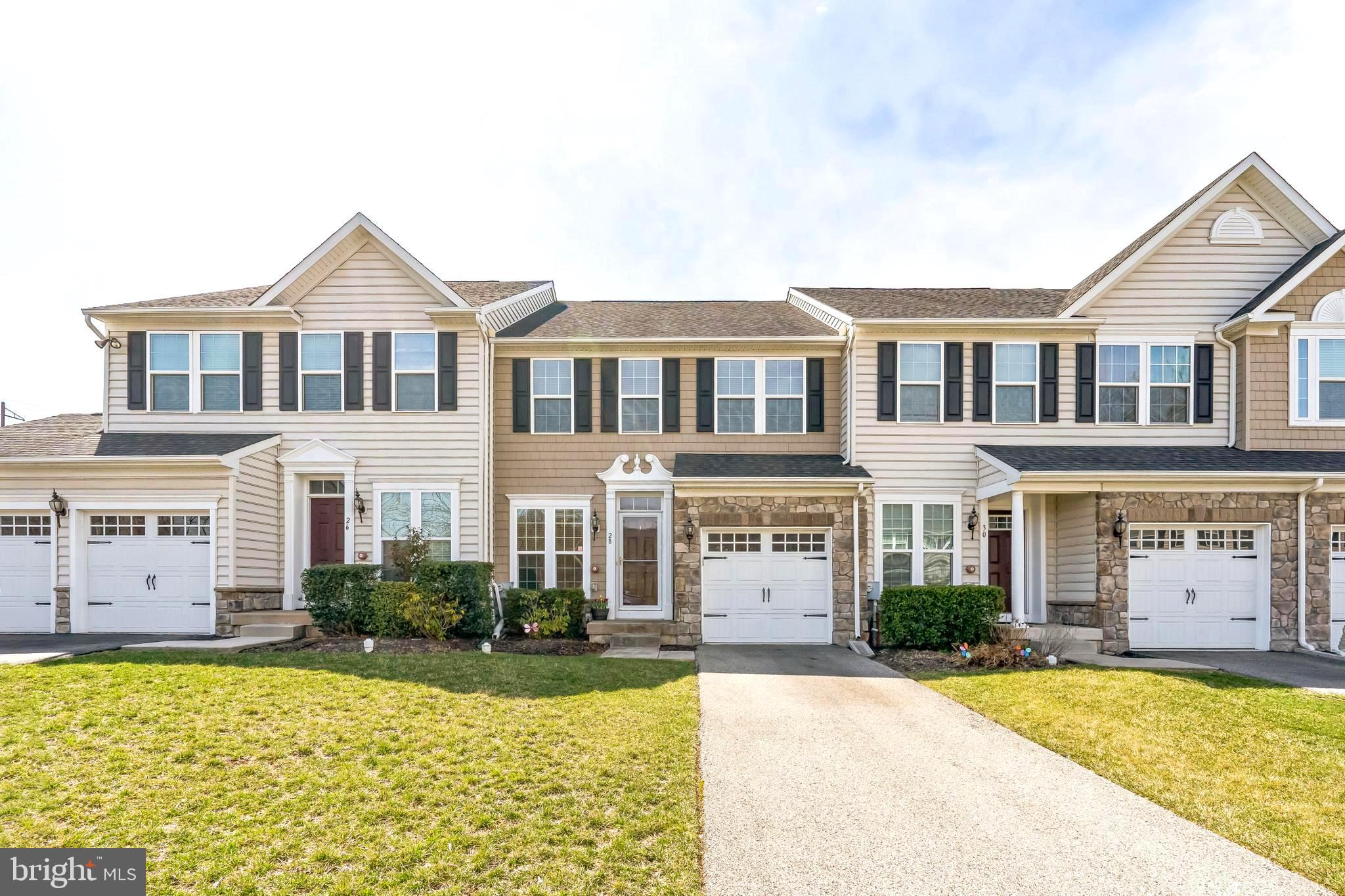 An exceptional open floor plan unit in the coveted Springfield Manor community within the highly rated Springfield School District. This beautiful modern home proudly offers the blend of modern luxury and comfortable living space in suburban setting and yet close to public transportation. The pride of ownership can be seen throughout the house - very well maintained beautiful hardwood floors on 1st and 2nd floors, upgraded granite kitchen countertop and premium cabinets, living/dining open floor design for airy feeling. Upstairs, the primary BR includes full bath, with double sink vanity and tub, and walk-in closet. Two additional rooms are Bright, spacious and share the hall bath that has large tub with sliding glass door. The laundry room is conveniently located on the 2nd floor. The basement is fully finished with built-in entertainment speakers for family enjoyment, gym, or for office space. Two windows in the basement allow natural lights, making the basement to be bright and cheery. Located in the A-rated Springfield School District, this home offers easy access to local amenities