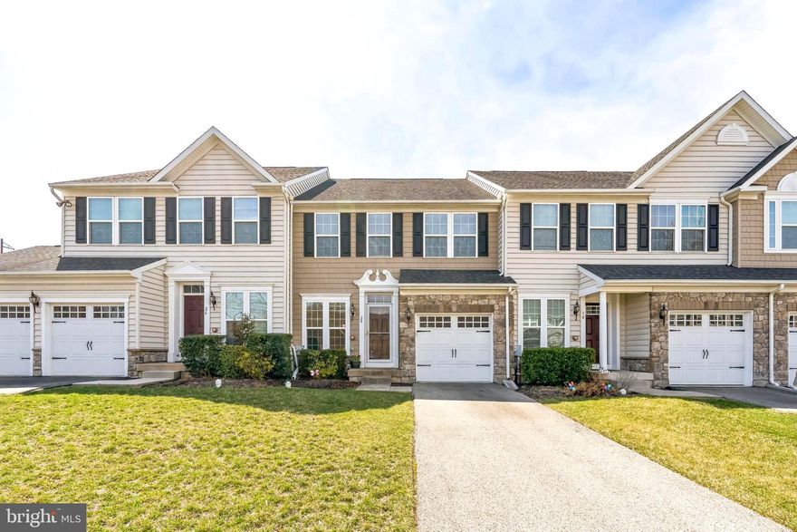 An exceptional open floor plan unit in the coveted Springfield Manor community within the highly rated Springfield School District. This beautiful modern home proudly offers the blend of modern luxury and comfortable living space in suburban setting and yet close to public transportation. The pride of ownership can be seen throughout the house - very well maintained beautiful hardwood floors on 1st and 2nd floors, upgraded granite kitchen countertop and premium cabinets, living/dining open floor design for airy feeling. Upstairs, the primary BR includes full bath, with double sink vanity and tub, and walk-in closet. Two additional rooms are Bright, spacious and share the hall bath that has large tub with sliding glass door. The laundry room is conveniently located on the 2nd floor. The basement is fully finished with built-in entertainment speakers for family enjoyment, gym, or for office space. Two windows in the basement allow natural lights, making the basement to be bright and cheery. Located in the A-rated Springfield School District, this home offers easy access to local amenities