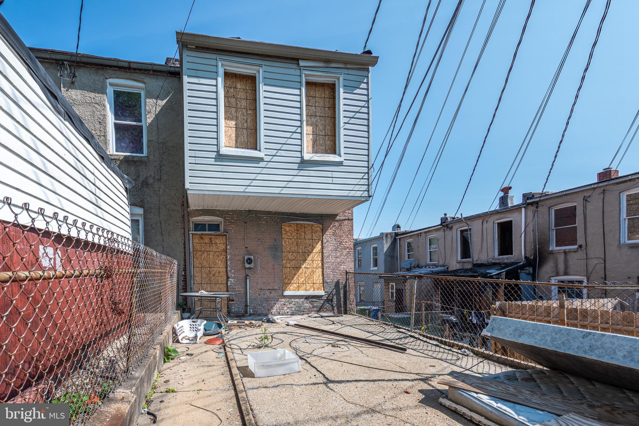 CALLING ALL INVESTORS! Spacious end of group rowhome that's ready for your renovations. Property has extensive fire damage and is need of a total renovation. Great opportunity to renovate and sell or fix up and add to your rental portfolio. Sold As-Is! Property will not be trashed out.