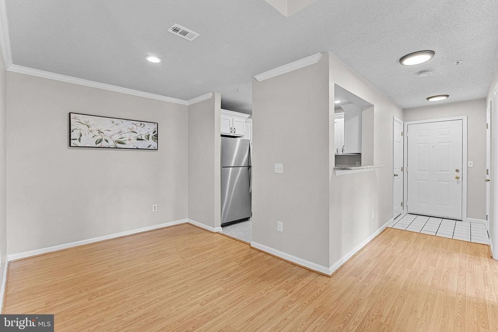 Photo of 12000 Taliesin Place #36, RESTON, VA 20190 (MLS # VAFX2273934)